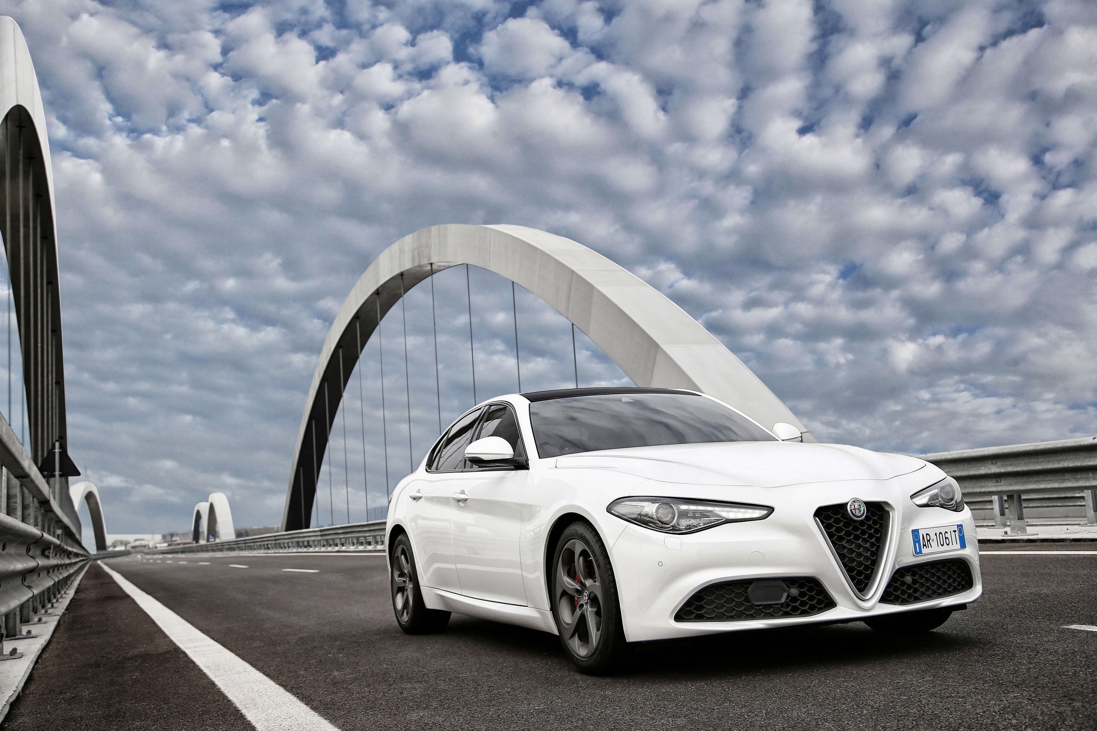 White Alfa Romeo Giulia on a bridge HD Wallpaper