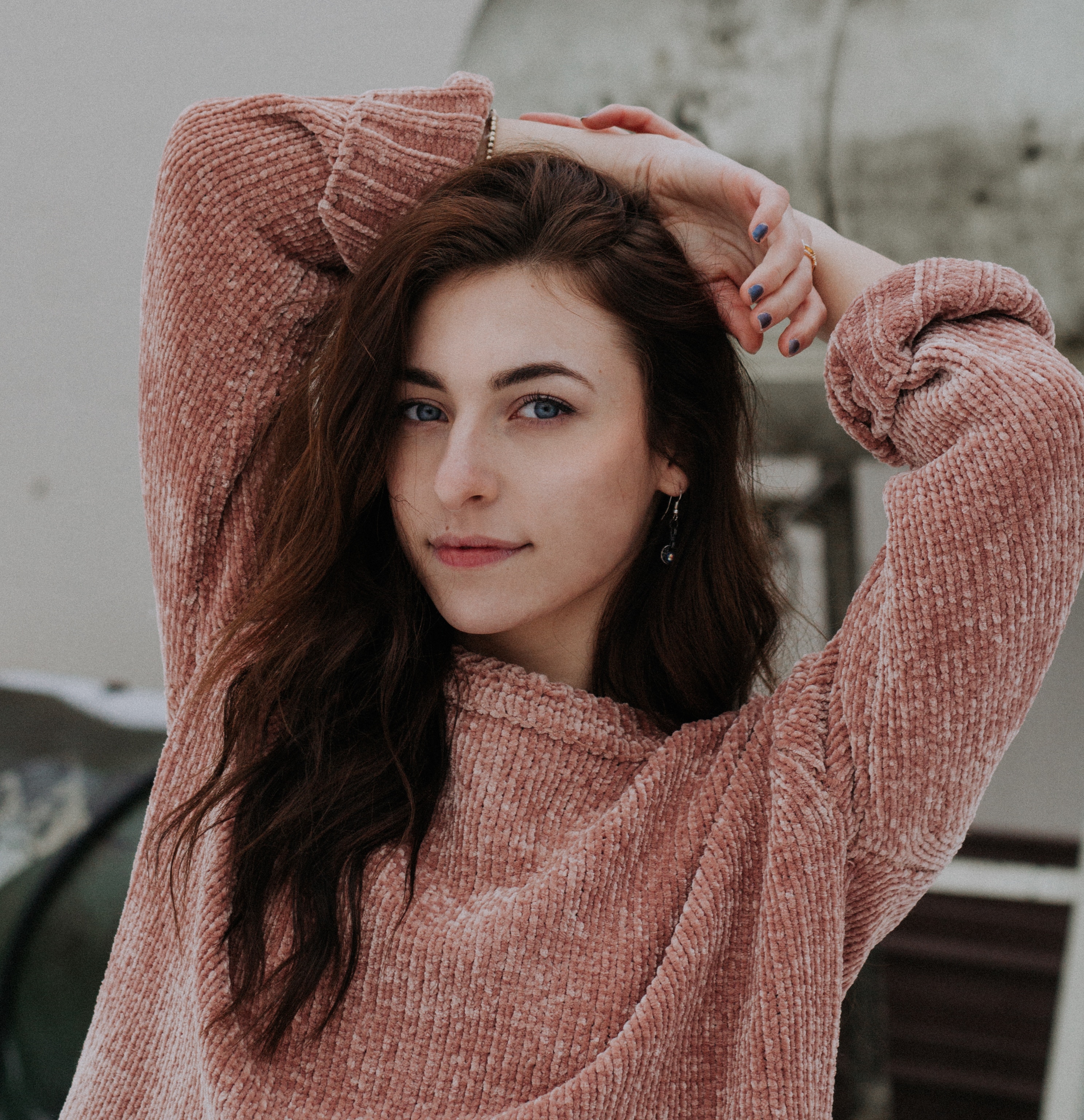 Woman with brown hair wearing a pink sweater HD Wallpaper