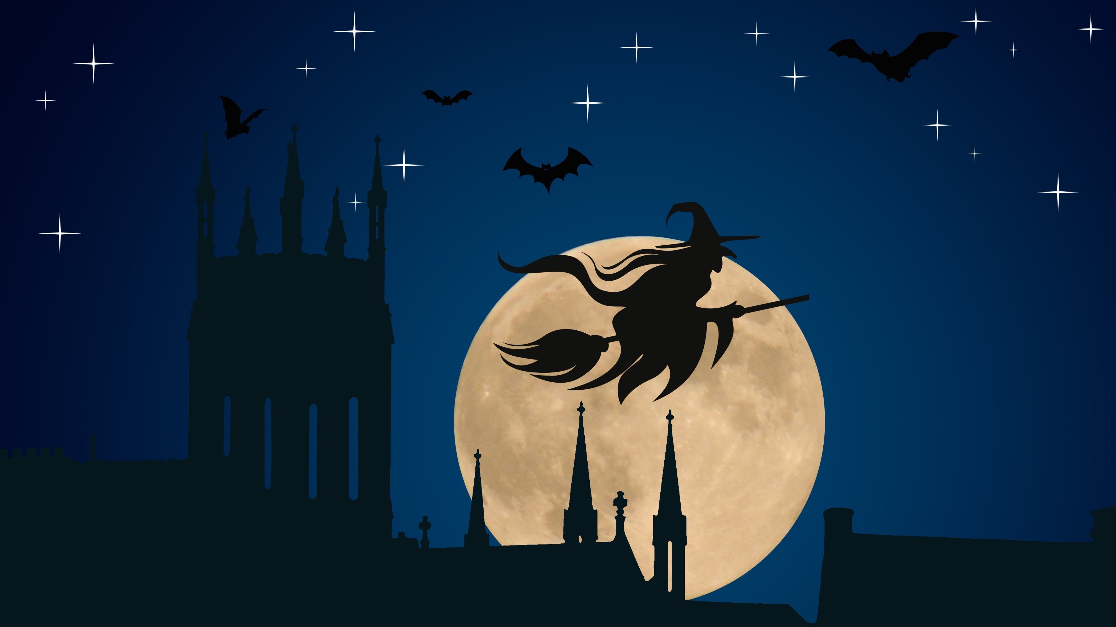 Halloween witch flying over city skyline at night HD Wallpaper