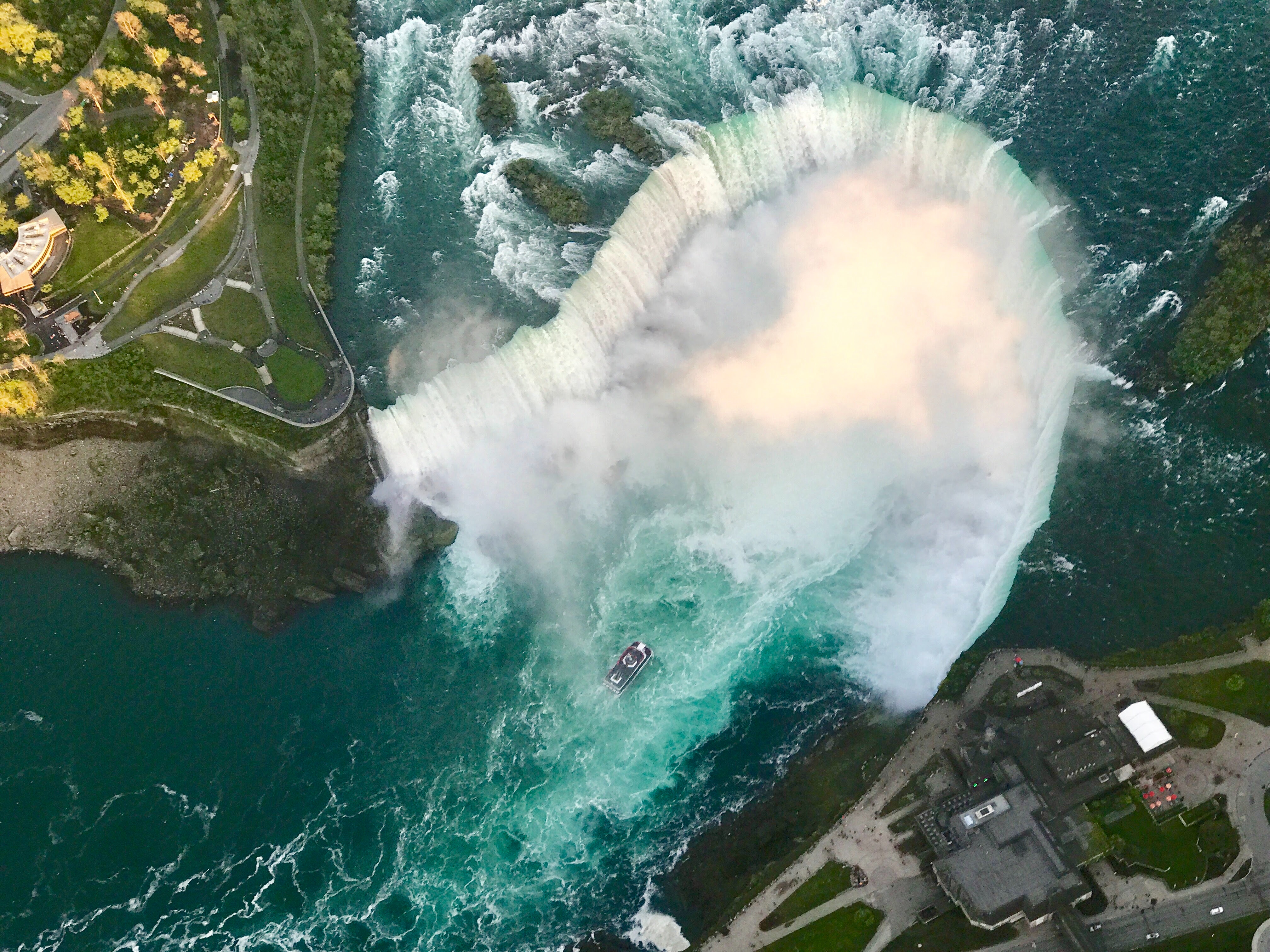 Aerial view of Niagara Falls with a boat HD Wallpaper