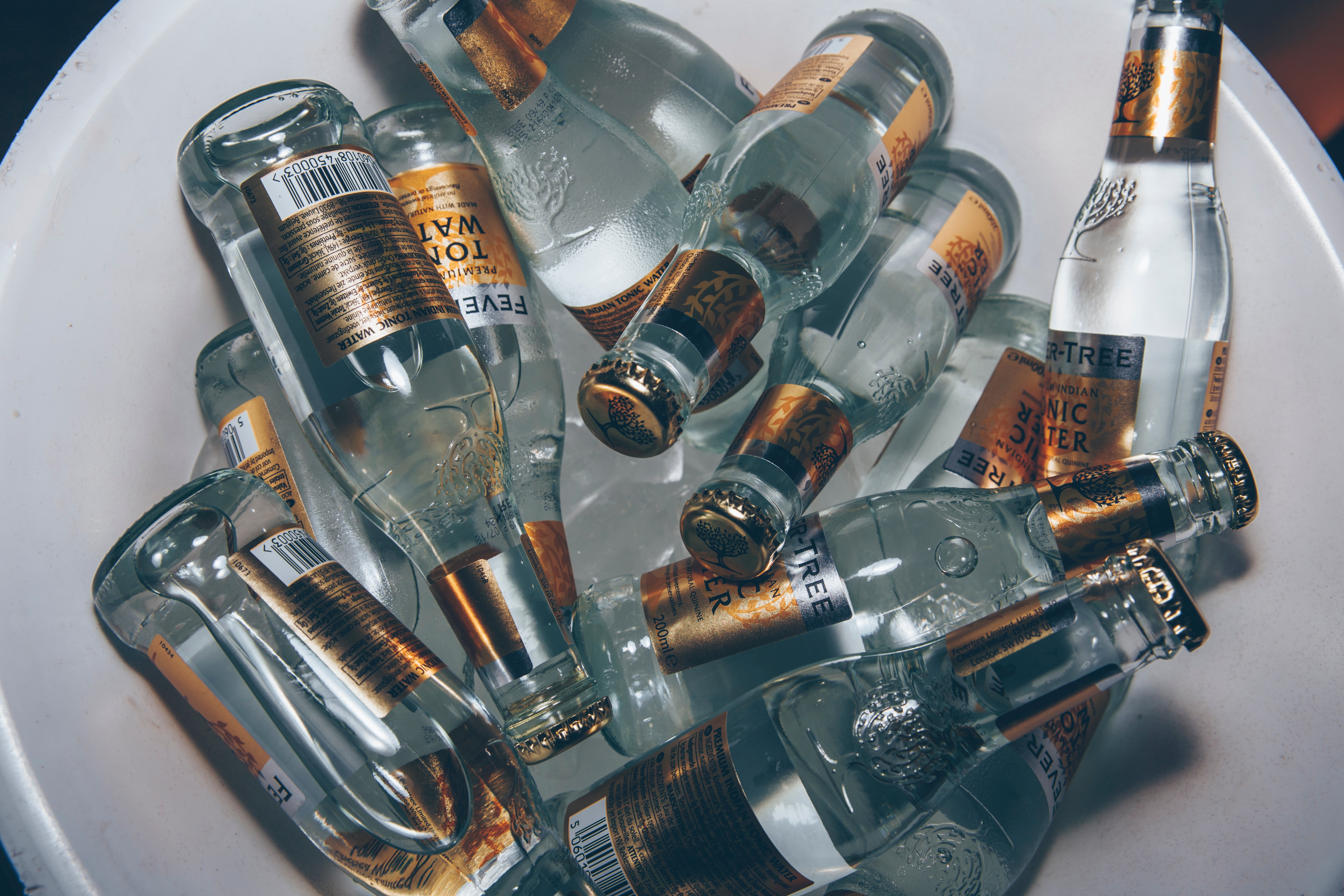 Fever-Tree Tonic Water Bottles in Ice HD Wallpaper