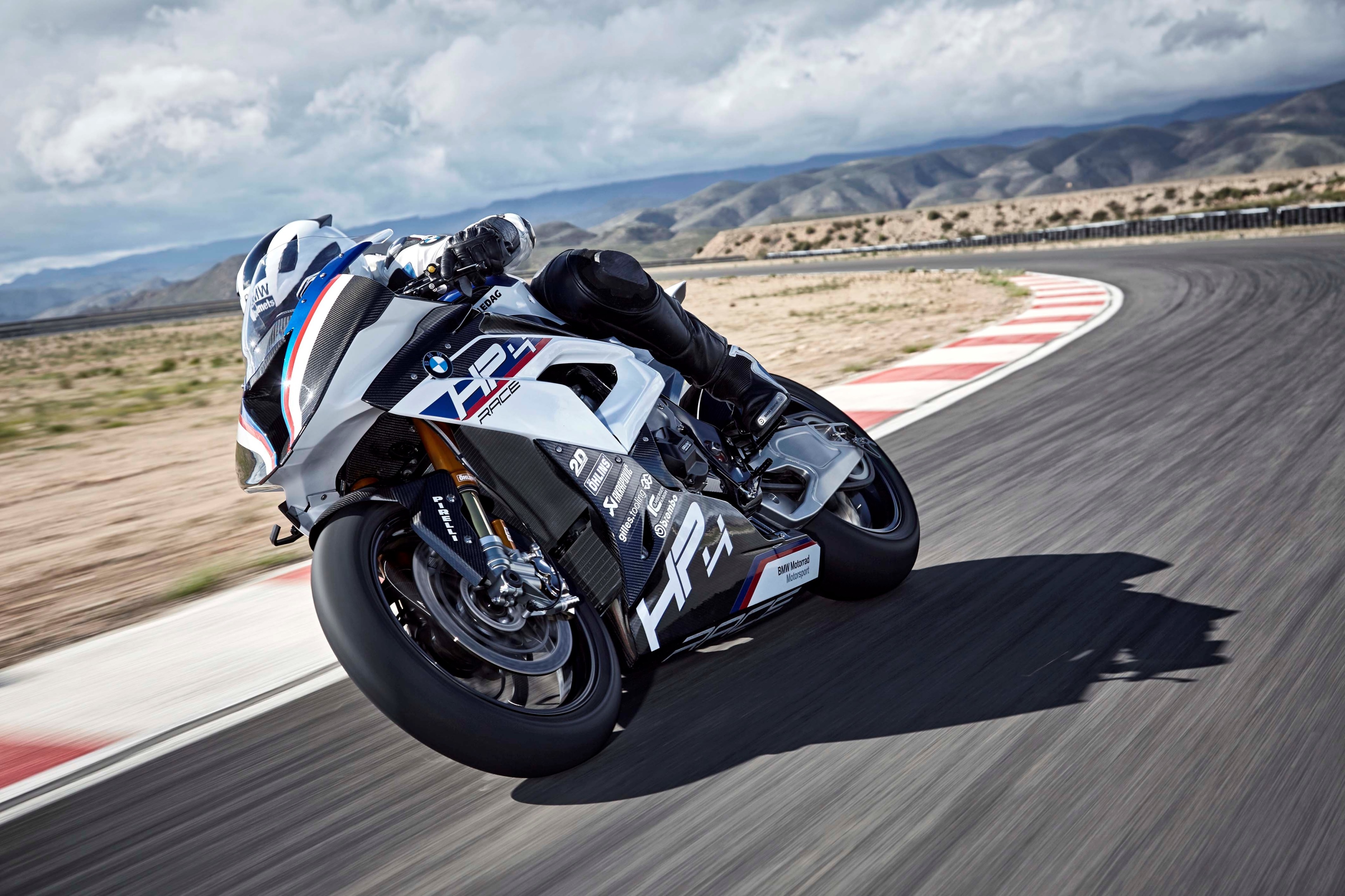 BMW HP4 Race motorcycle on a race track HD Wallpaper