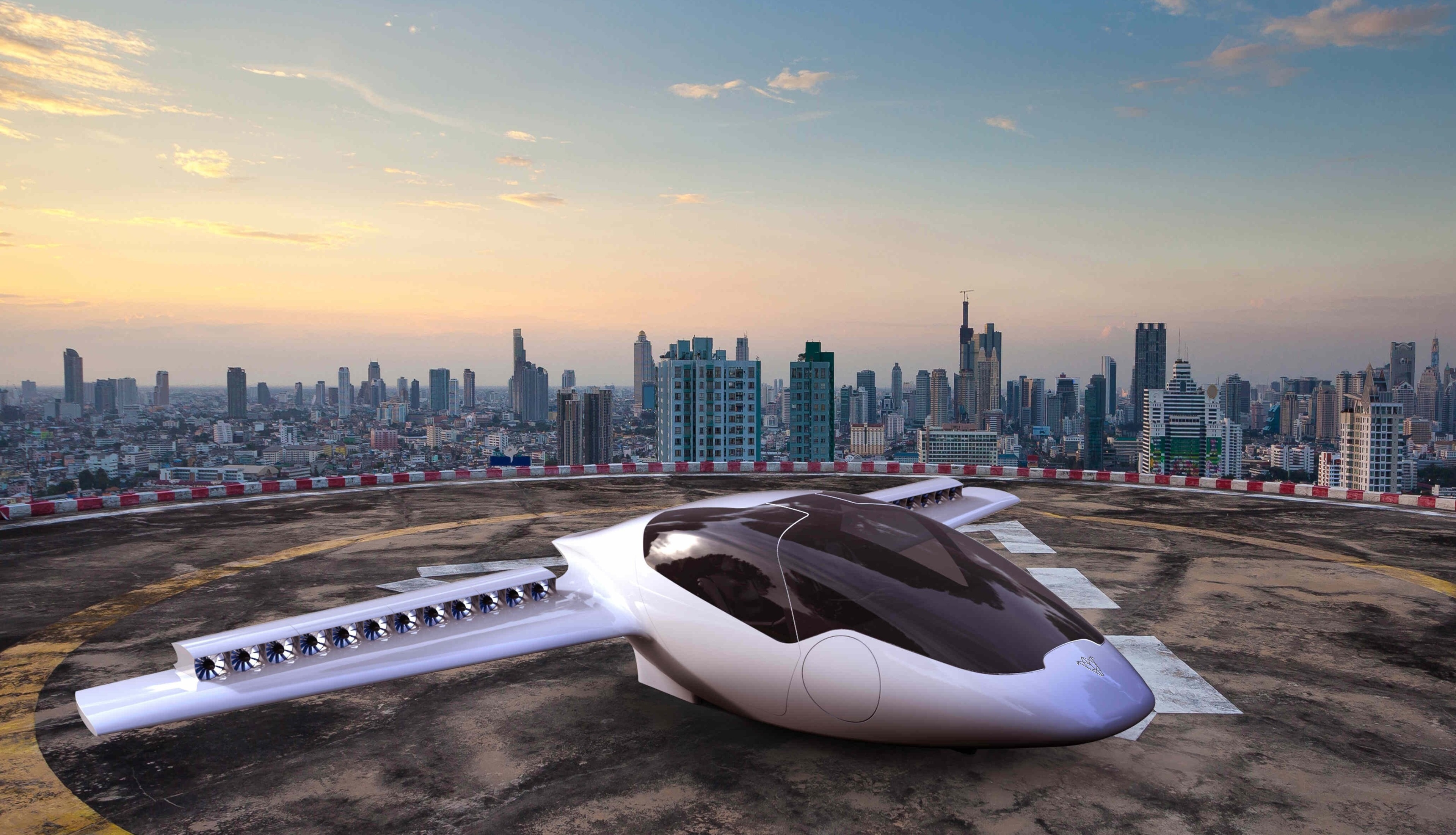 Lilium Jet on helipad with city skyline HD Wallpaper