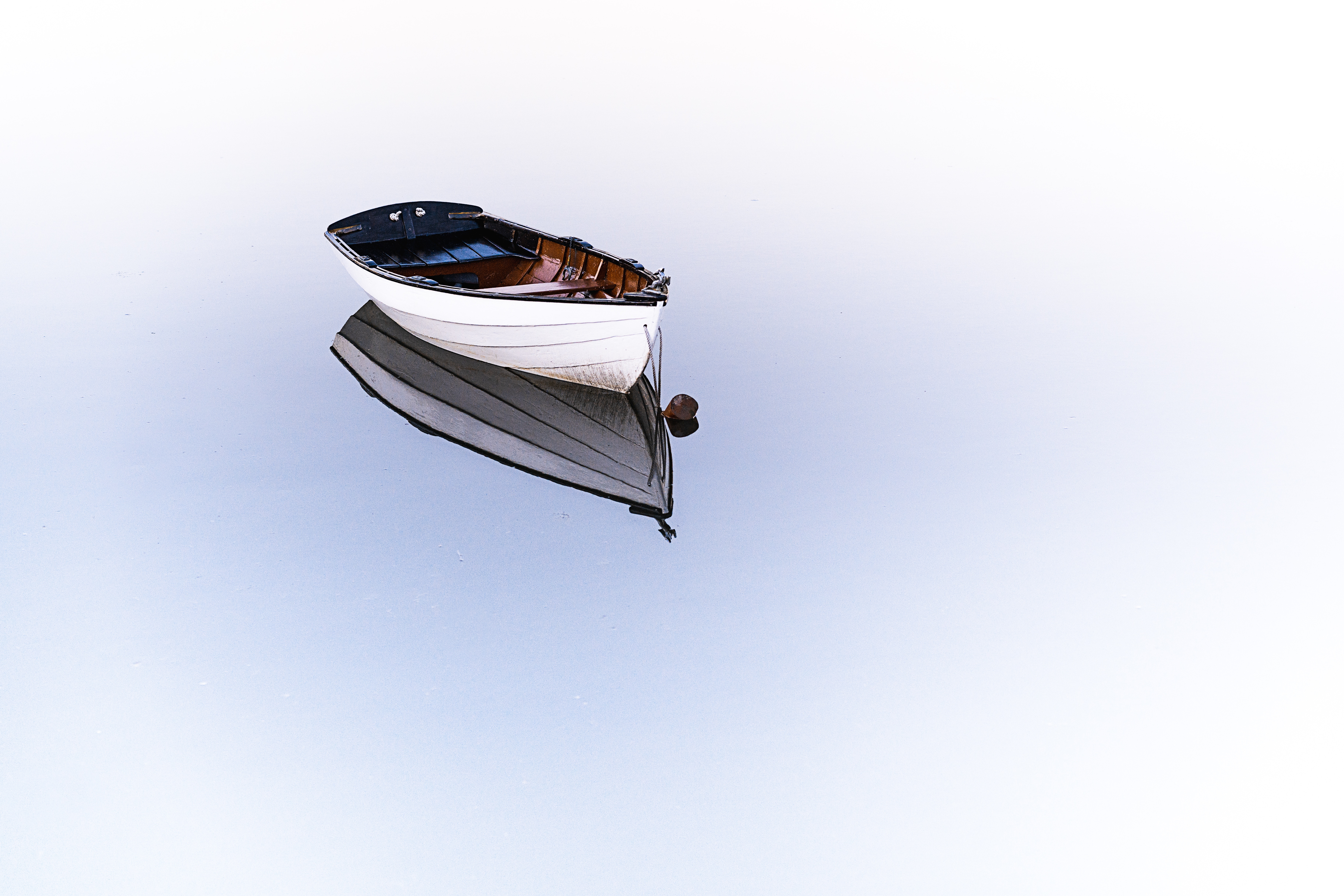 Minimalist boat reflected on clear water HD Wallpaper