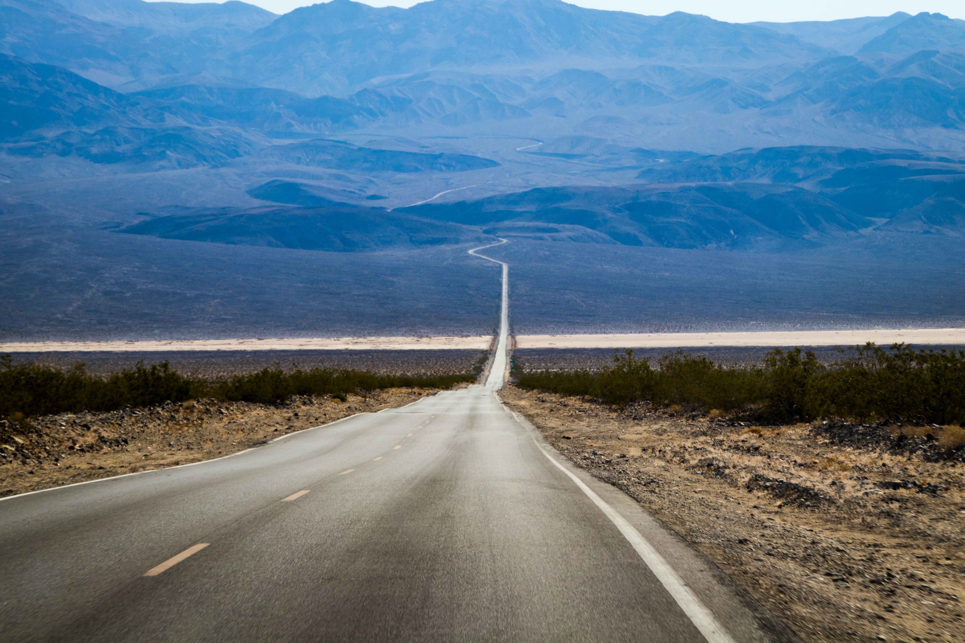 Road through desert landscape to mountains 4K HD Wallpaper