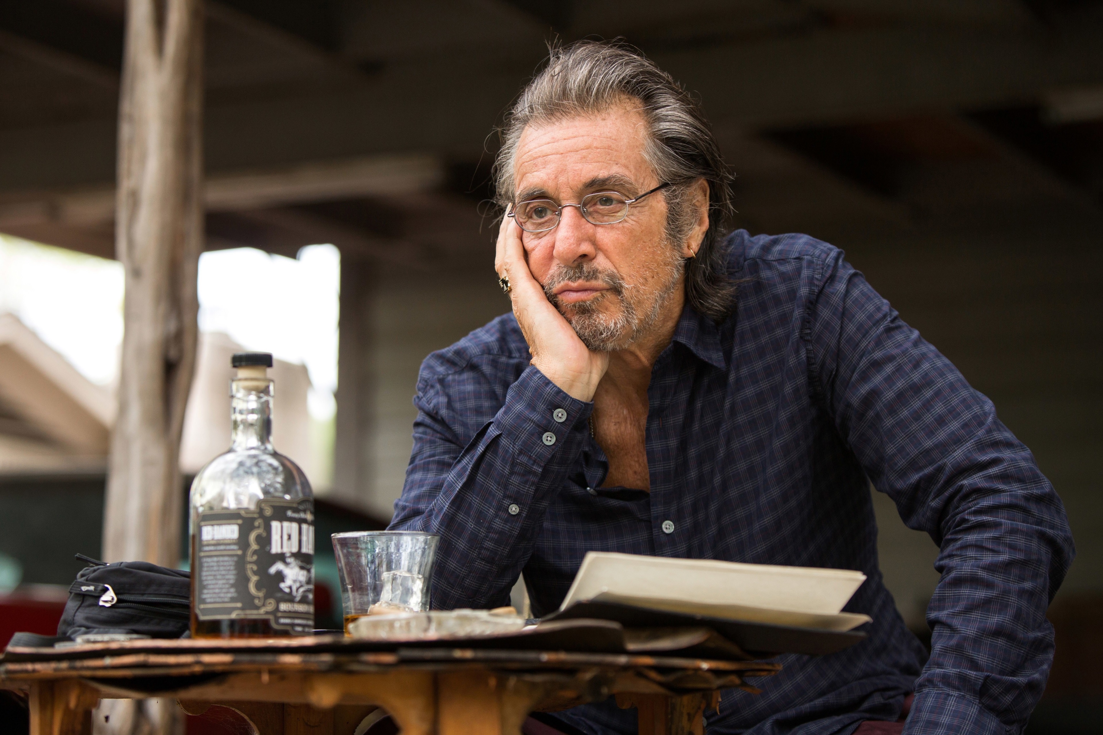Al Pacino with a bottle of whiskey HD Wallpaper