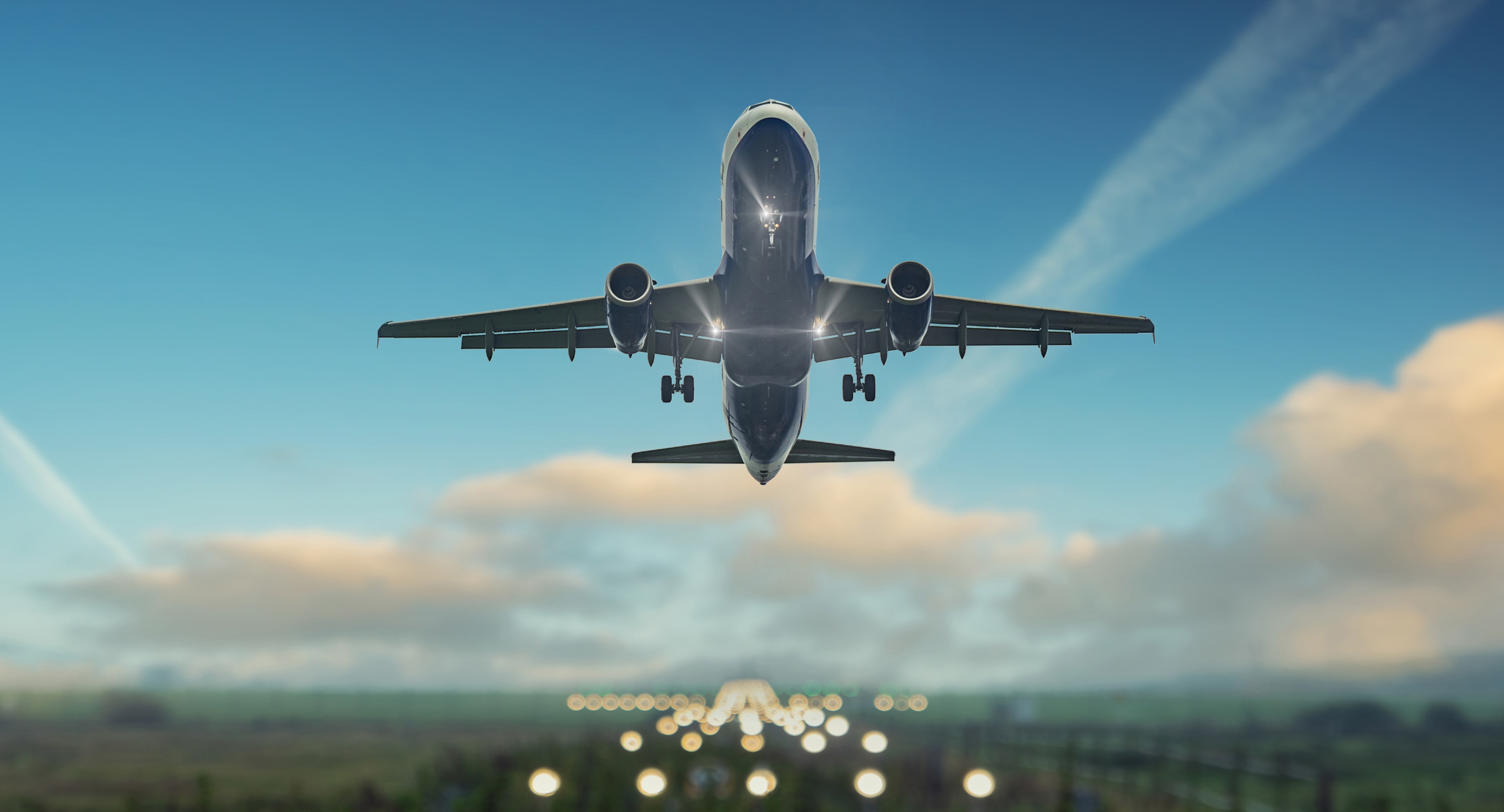 Airplane taking off from runway 4K HD Wallpaper