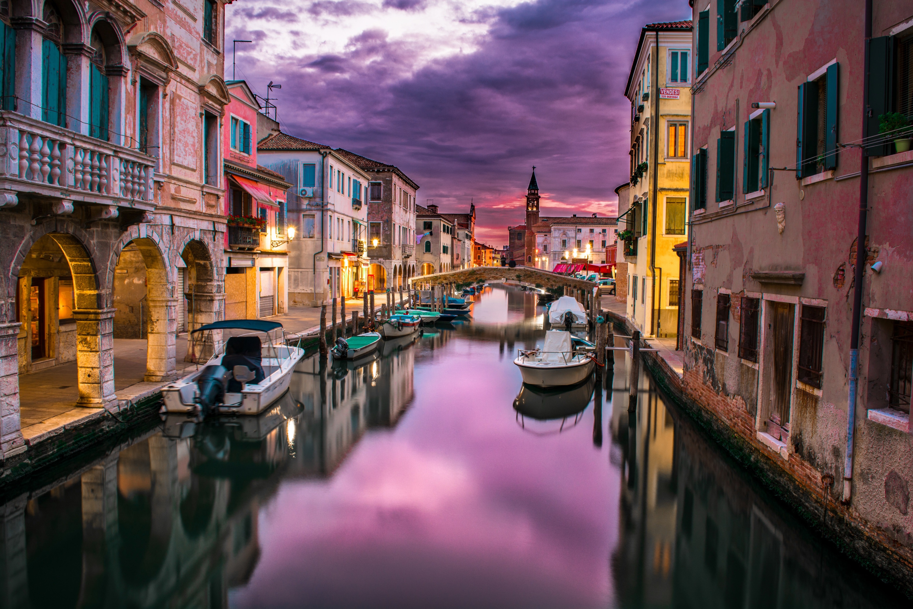 Venice canal at sunset with boats and bridge HD Wallpaper