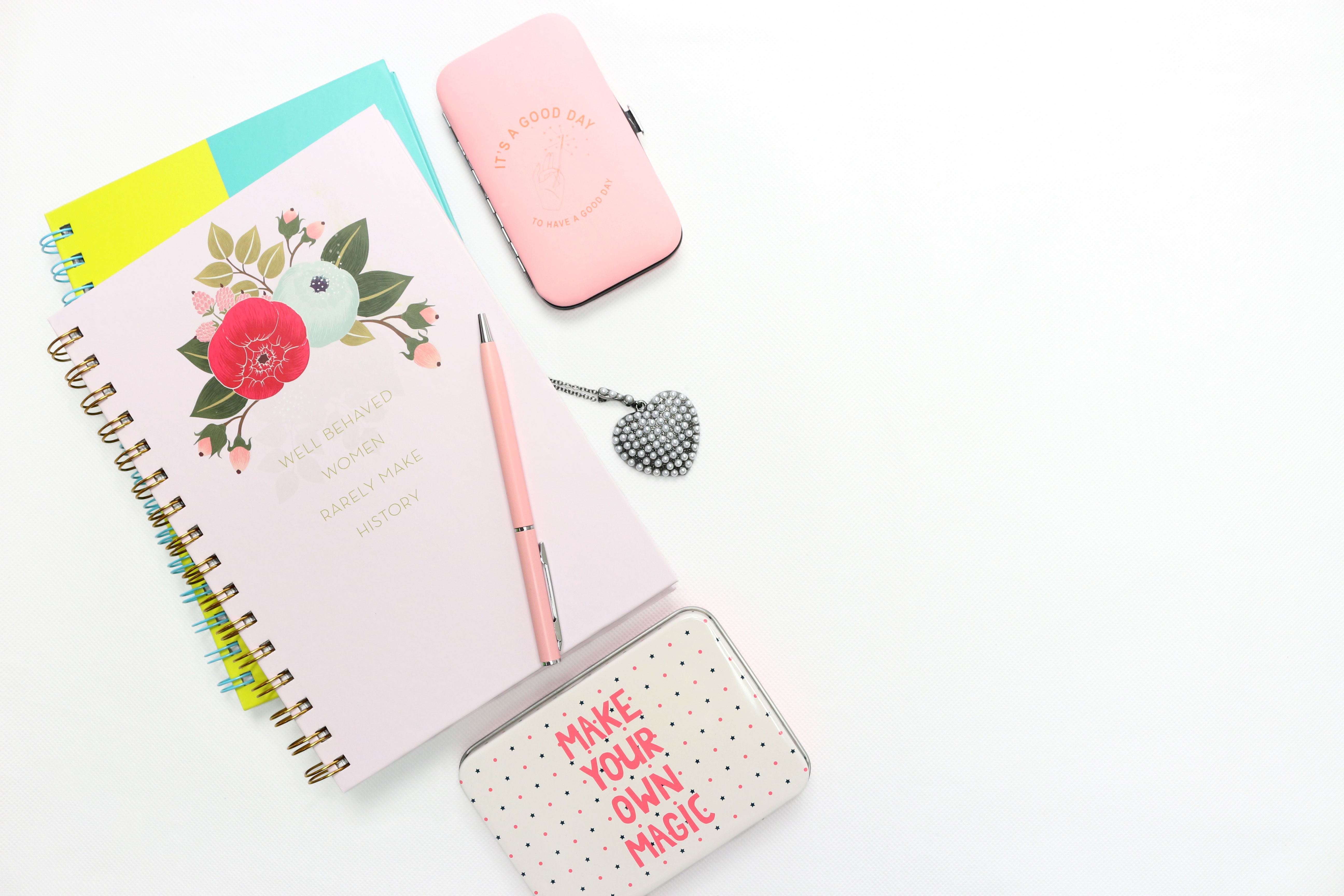 Pink notebook with floral design, pen, and jewelry HD Wallpaper