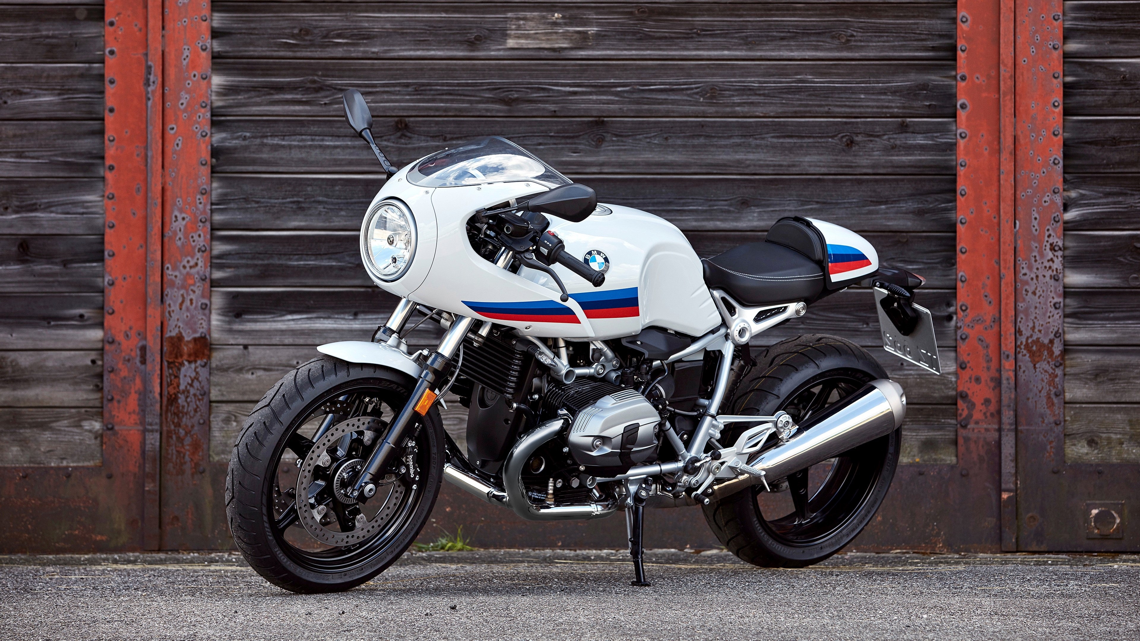 BMW R nineT motorcycle with racing stripes HD Wallpaper