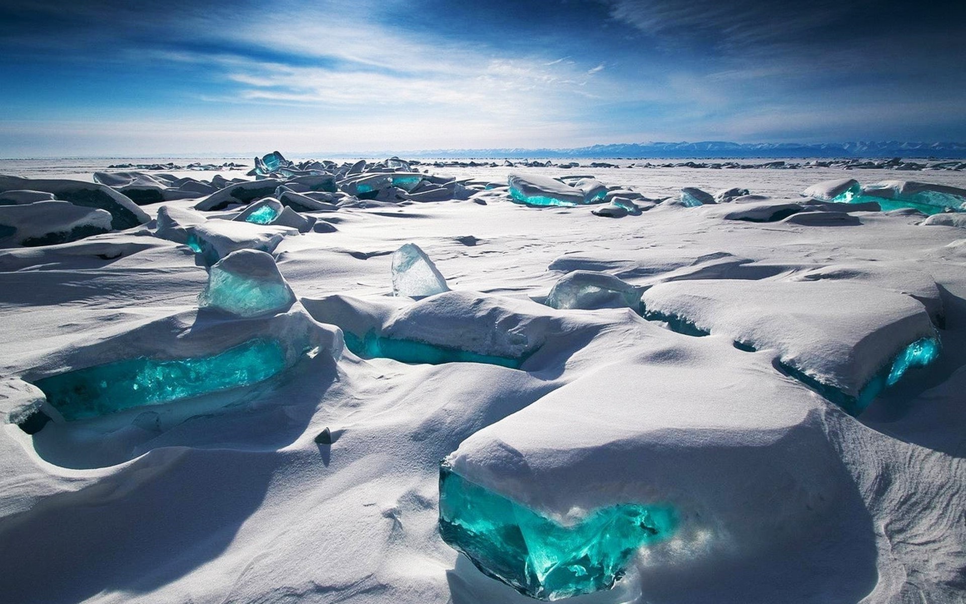 Snow-Covered Ice Chunks Glowing in Siberian Landscape HD Wallpaper