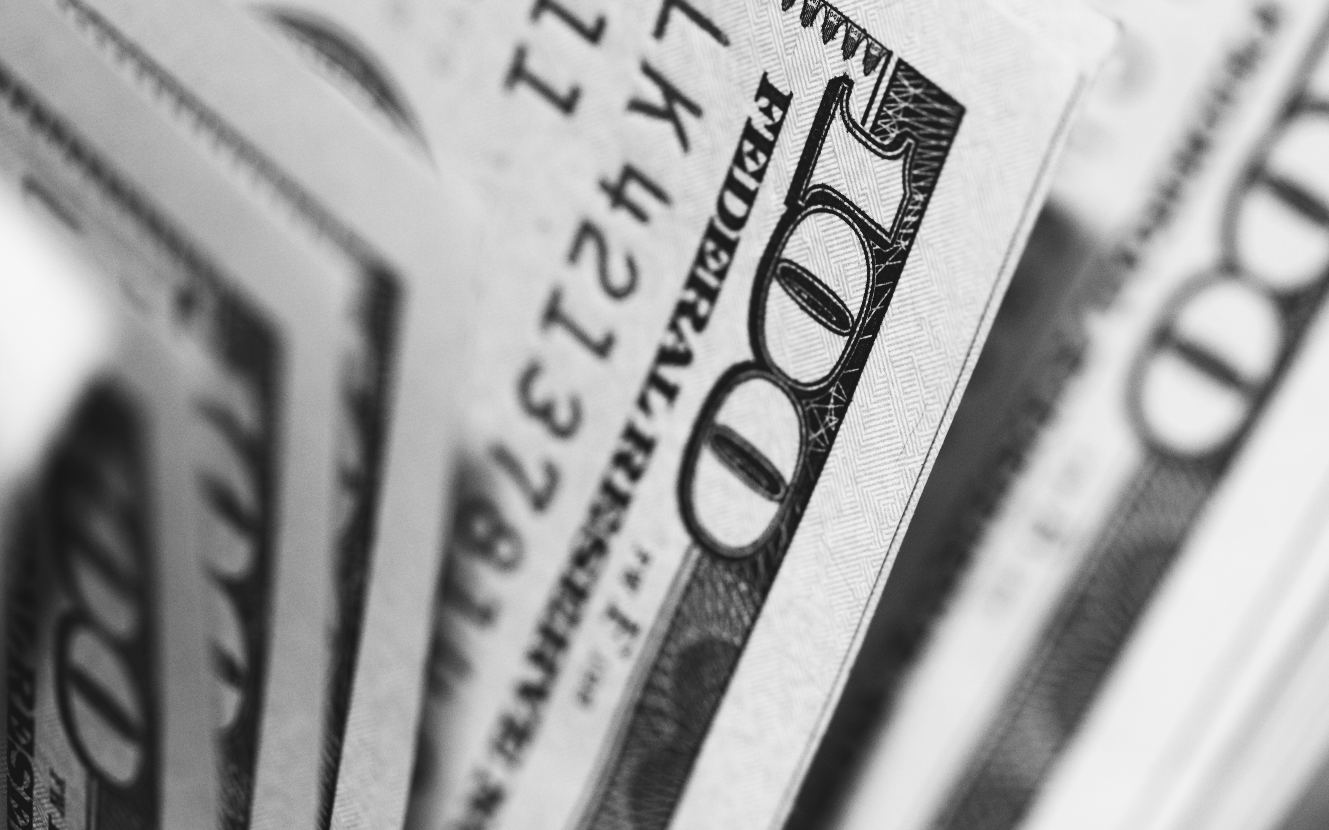 Close-up of a stack of US hundred dollar bills HD Wallpaper