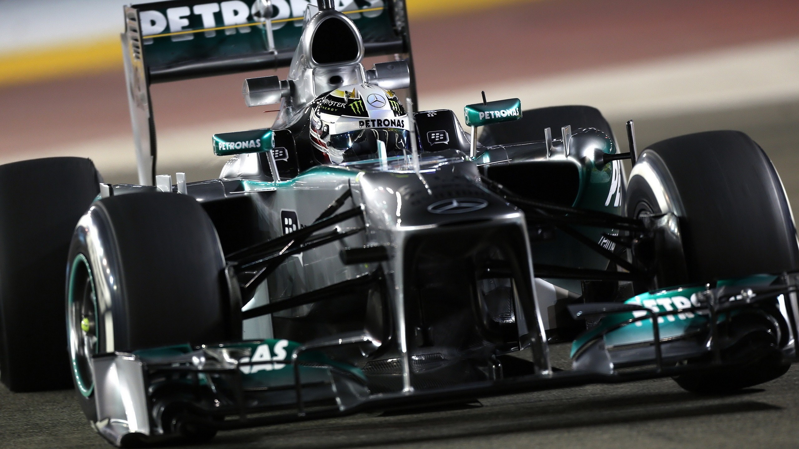 Lewis Hamilton driving a Mercedes Formula 1 car HD Wallpaper