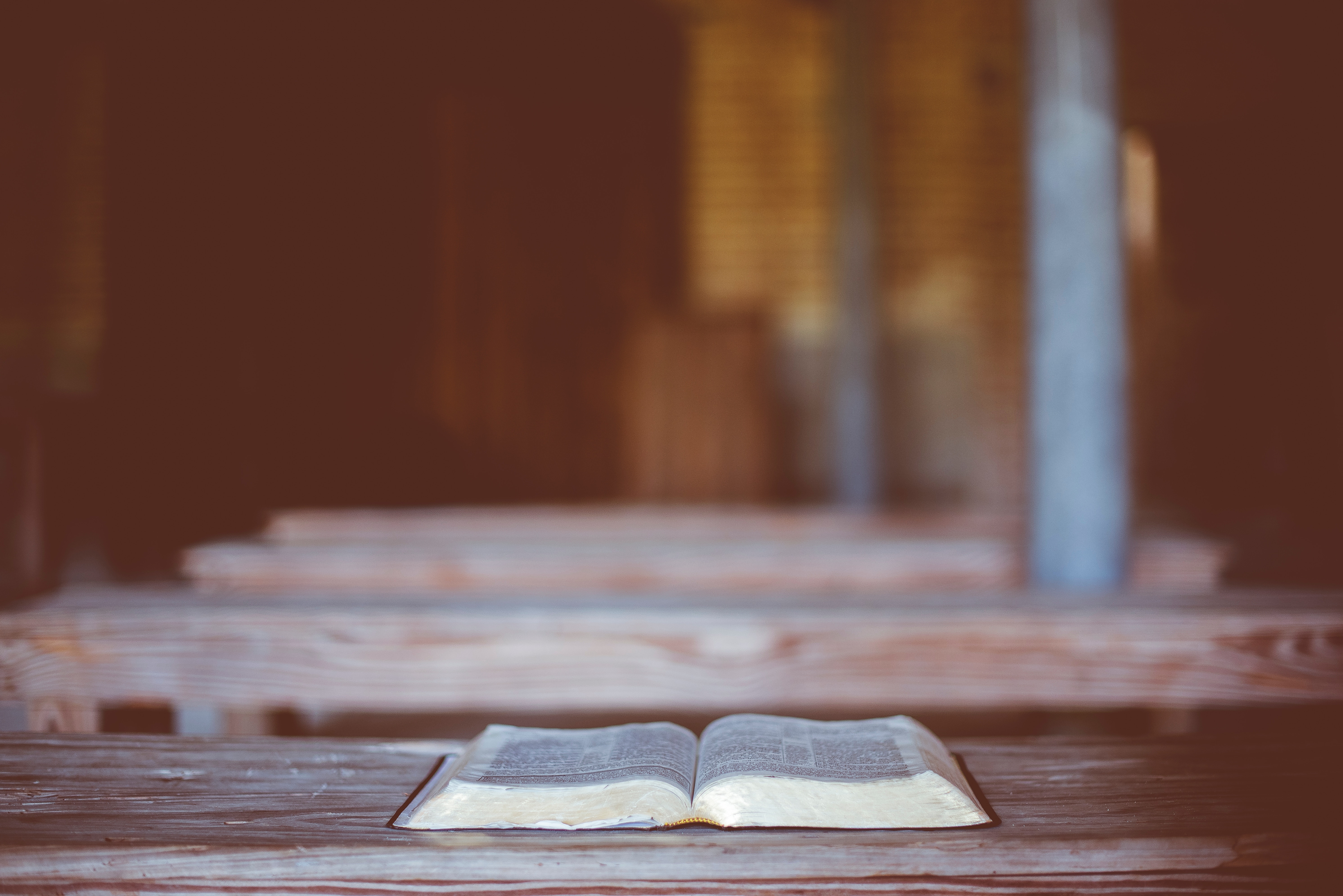Open Bible on a Wooden Surface HD Wallpaper