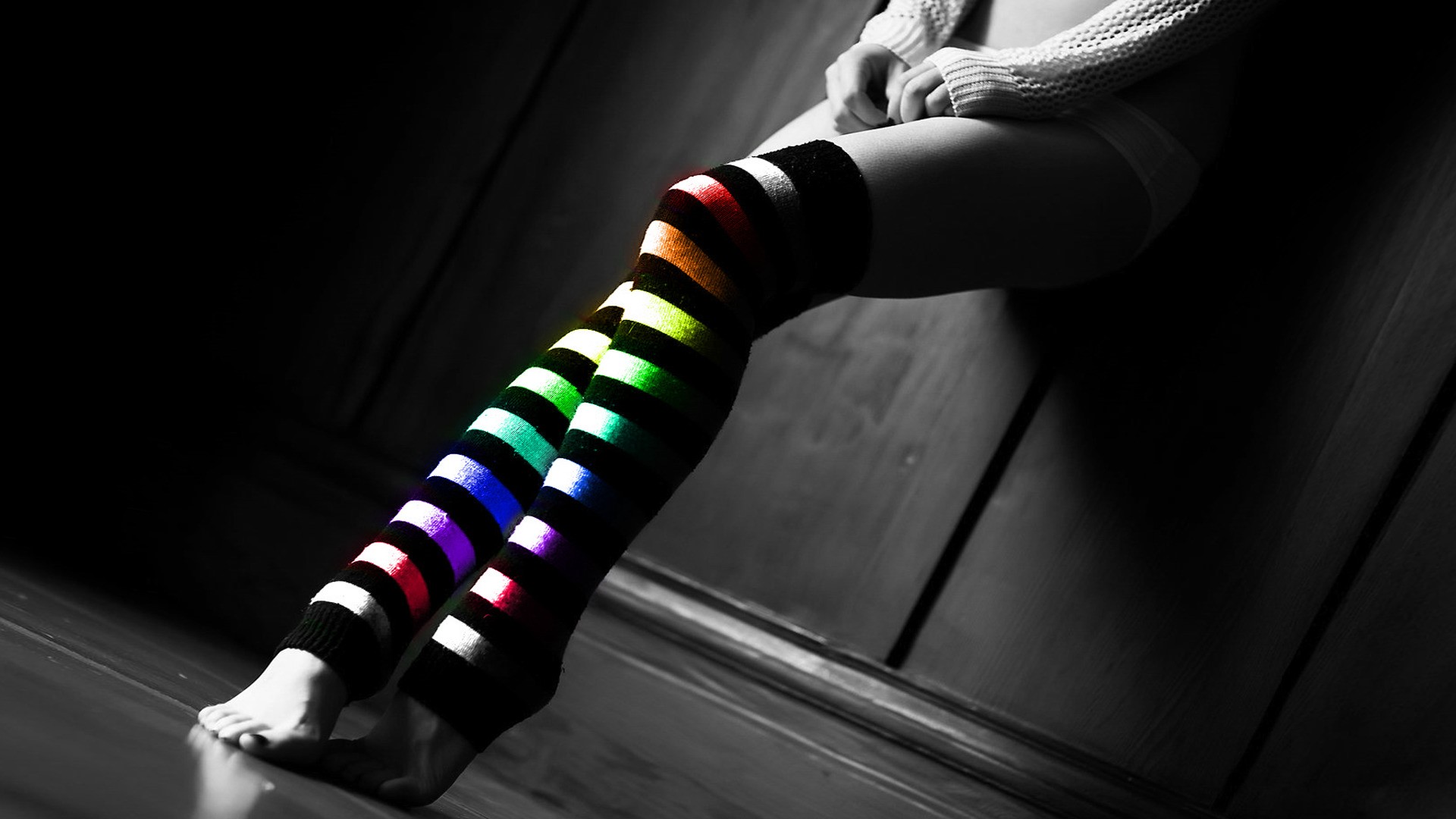 Legs with colorful striped thigh-high socks HD Wallpaper