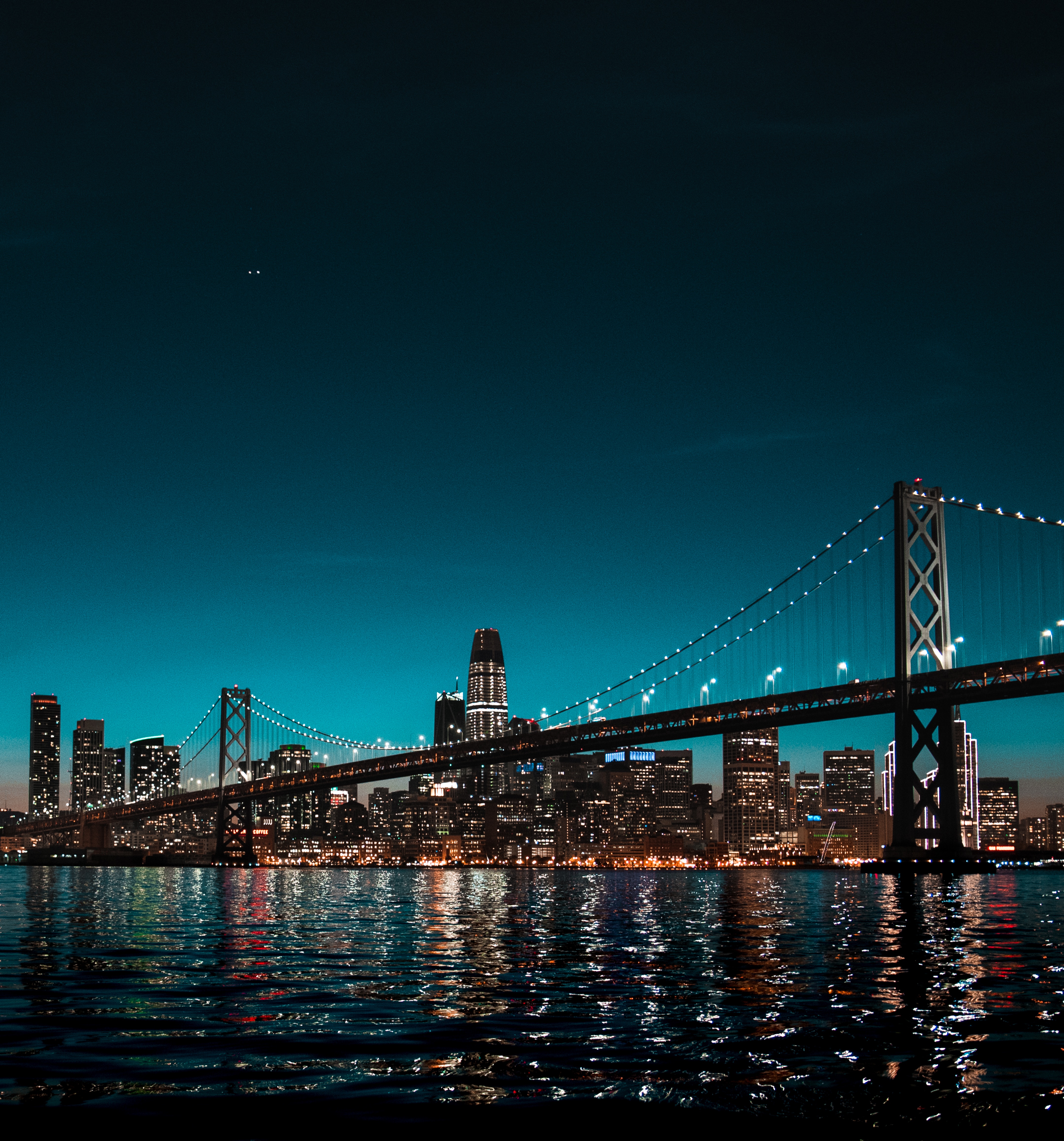 San Francisco cityscape with bridge at night HD Wallpaper