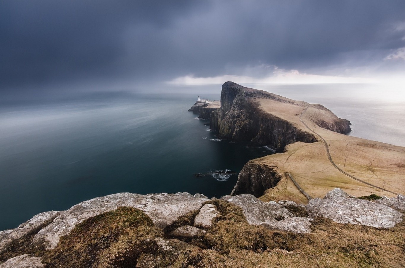 Neist Point Lighthouse on a stormy day in Scotland HD Wallpaper