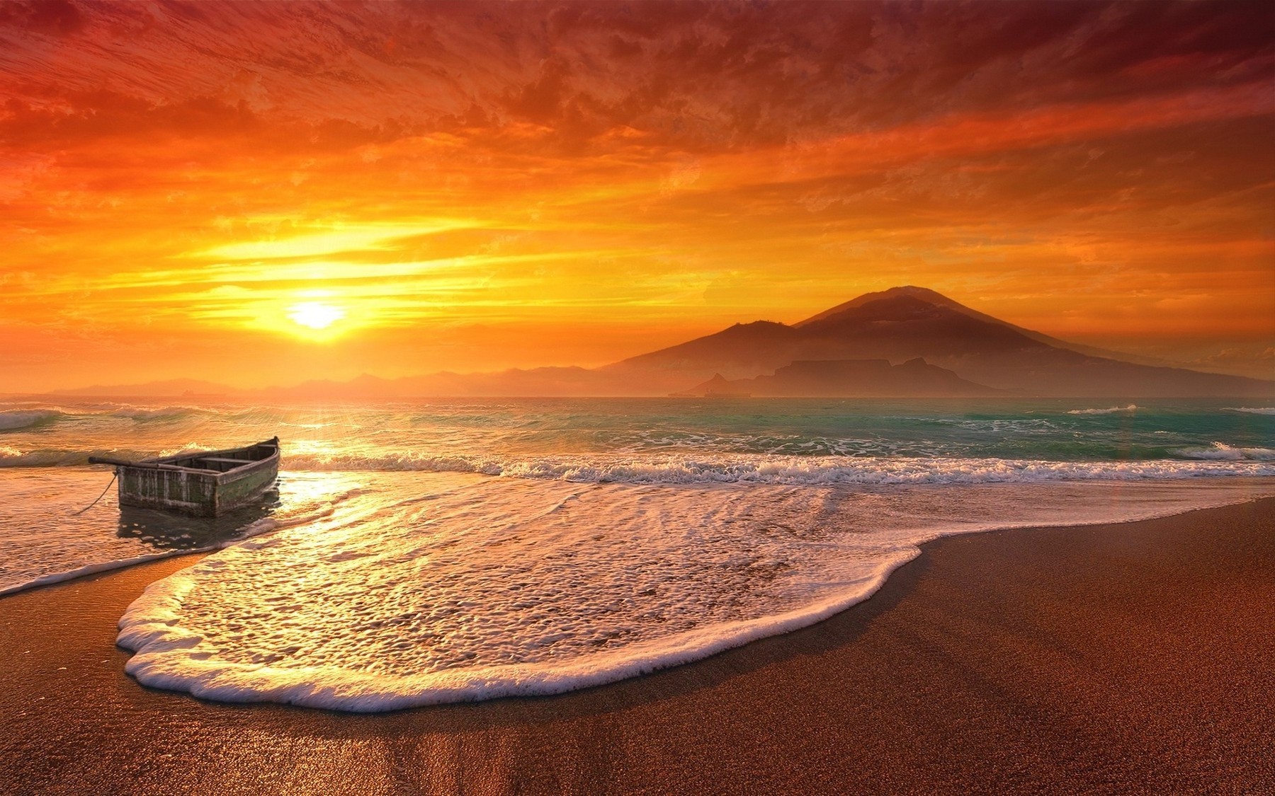 Sunset over the sea with a boat and mountain HD Wallpaper
