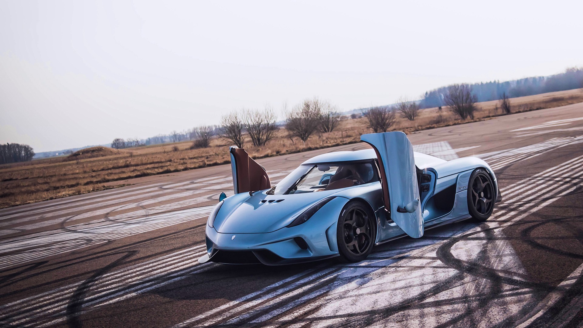 Koenigsegg Regera on a Racetrack HD Wallpaper