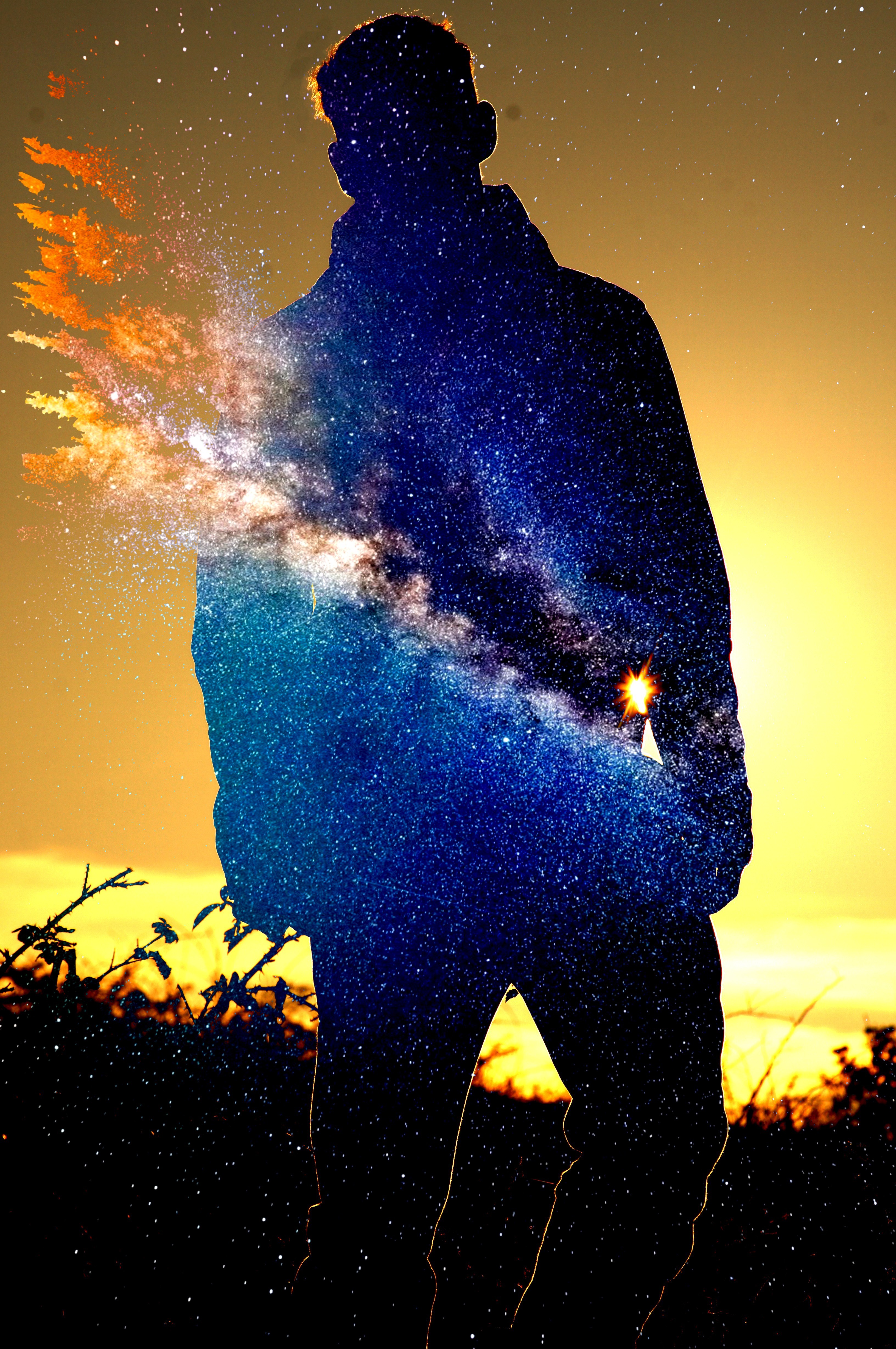 Silhouette of a person filled with galaxy and stars during sunset HD Wallpaper