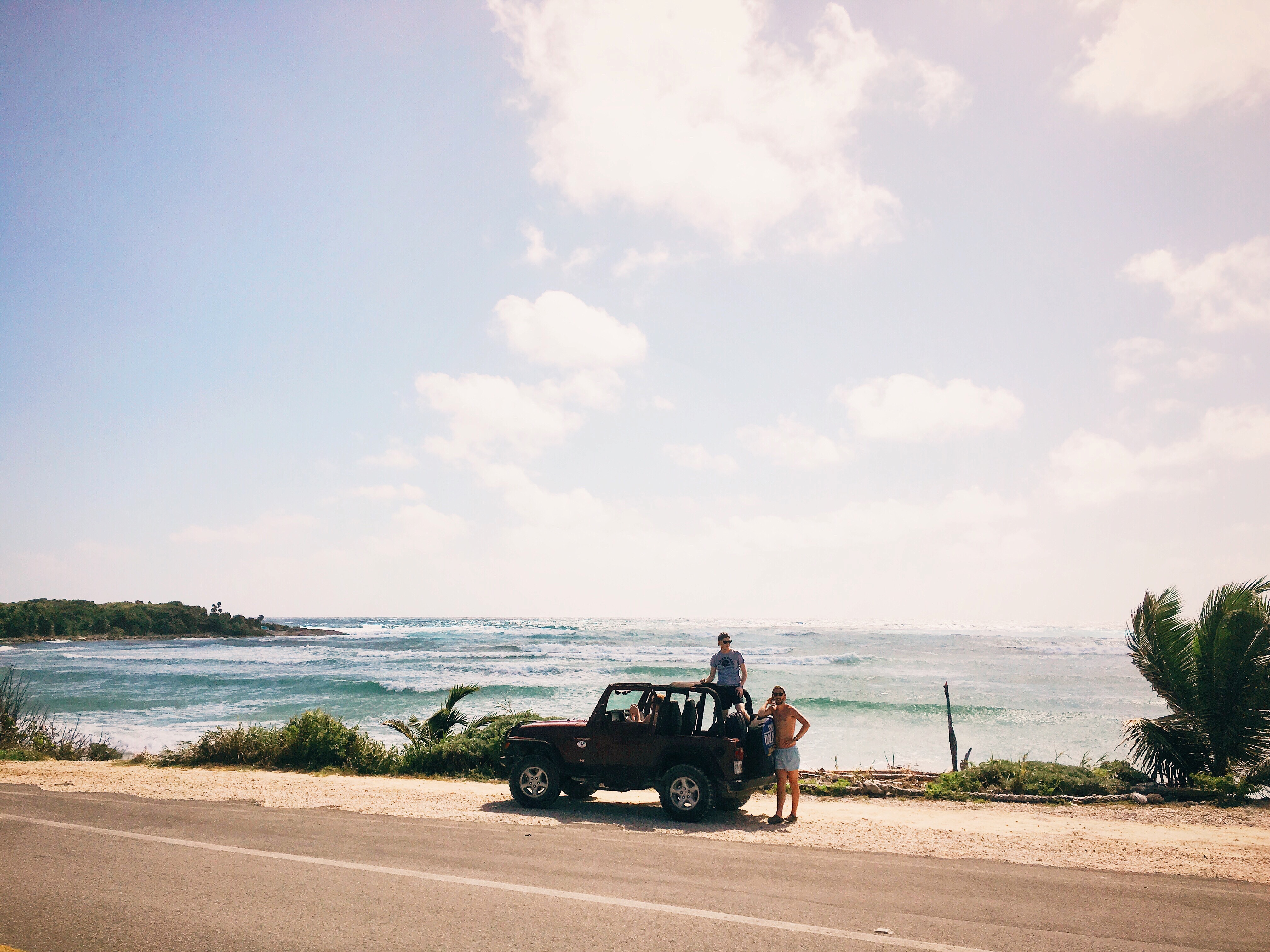 People by a Jeep on a Beach Road HD Wallpaper