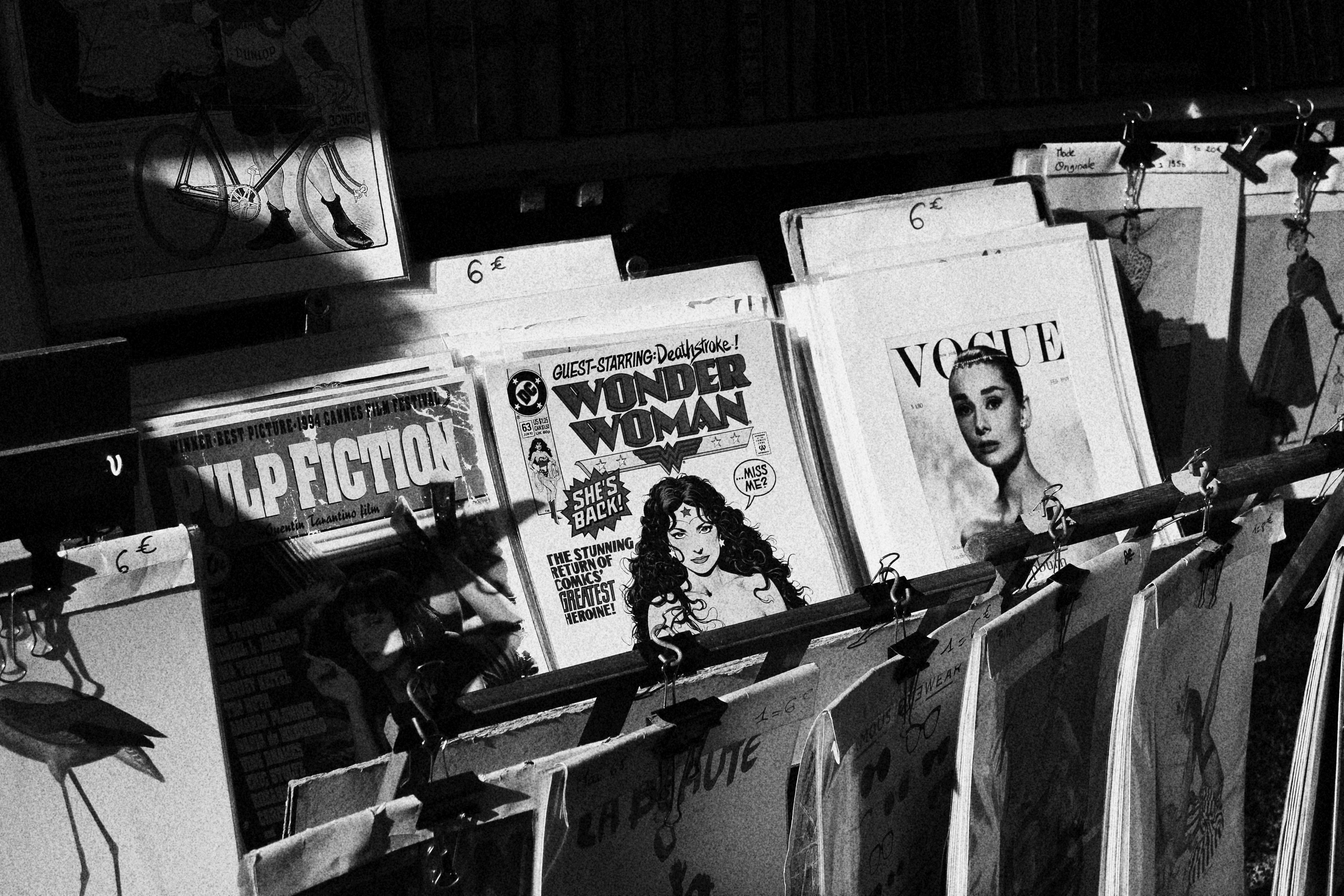 Wonder Woman and Vogue magazines at a market stall HD Wallpaper