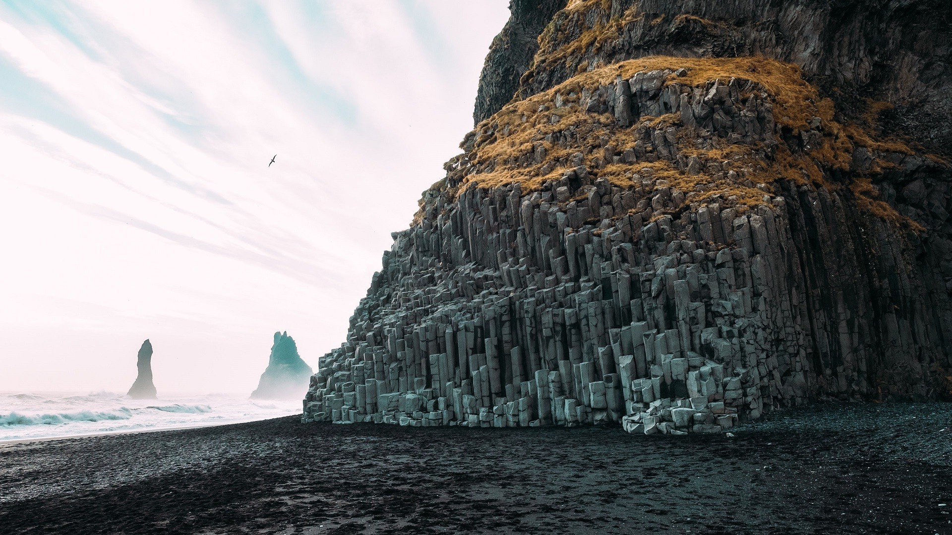 Basalt columns on Reynisfjara black sand beach, Iceland HD Wallpaper