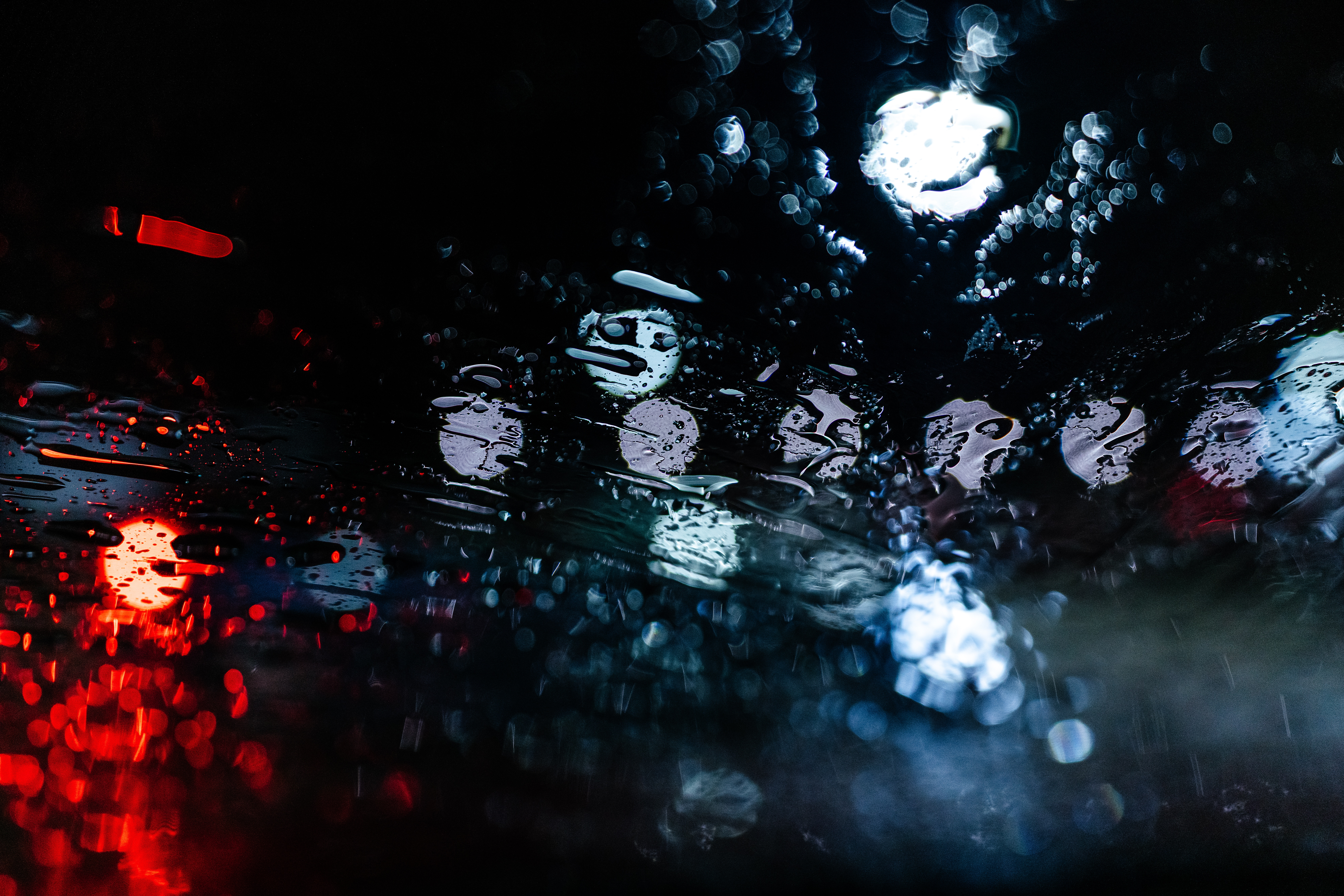 Bokeh lights on a wet surface at night HD Wallpaper