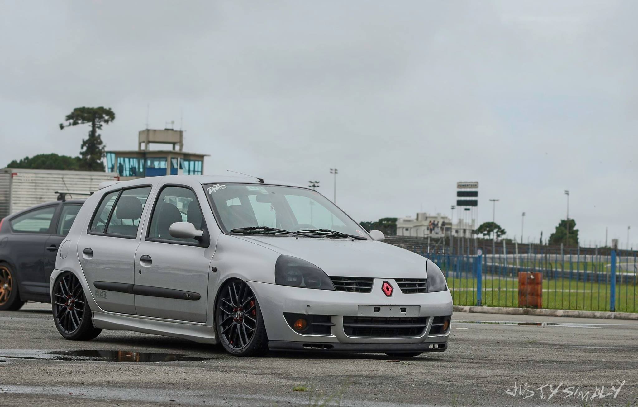 Silver Renault Clio on a Race Track HD Wallpaper