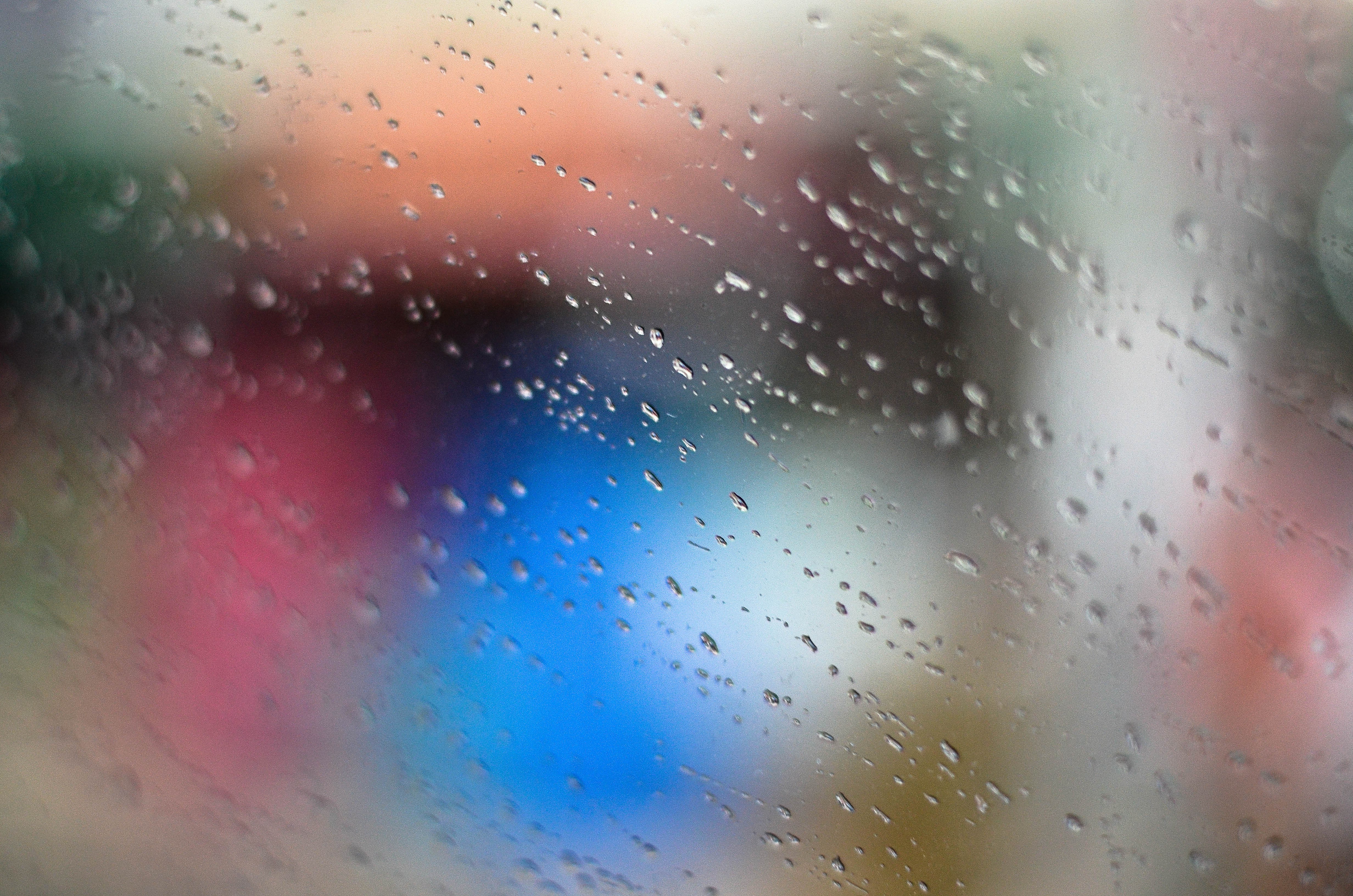 Abstract bokeh with water droplets on glass HD Wallpaper