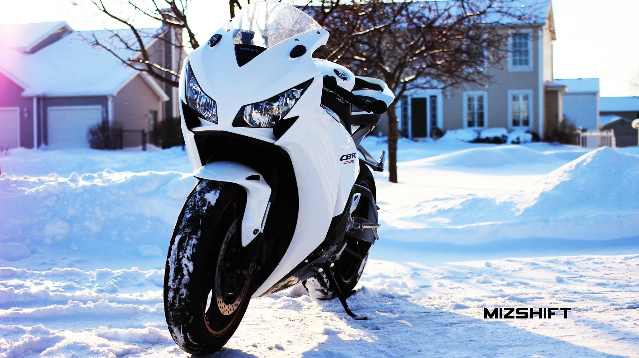 White Honda CBR 1000 RR motorcycle in snow HD Wallpaper