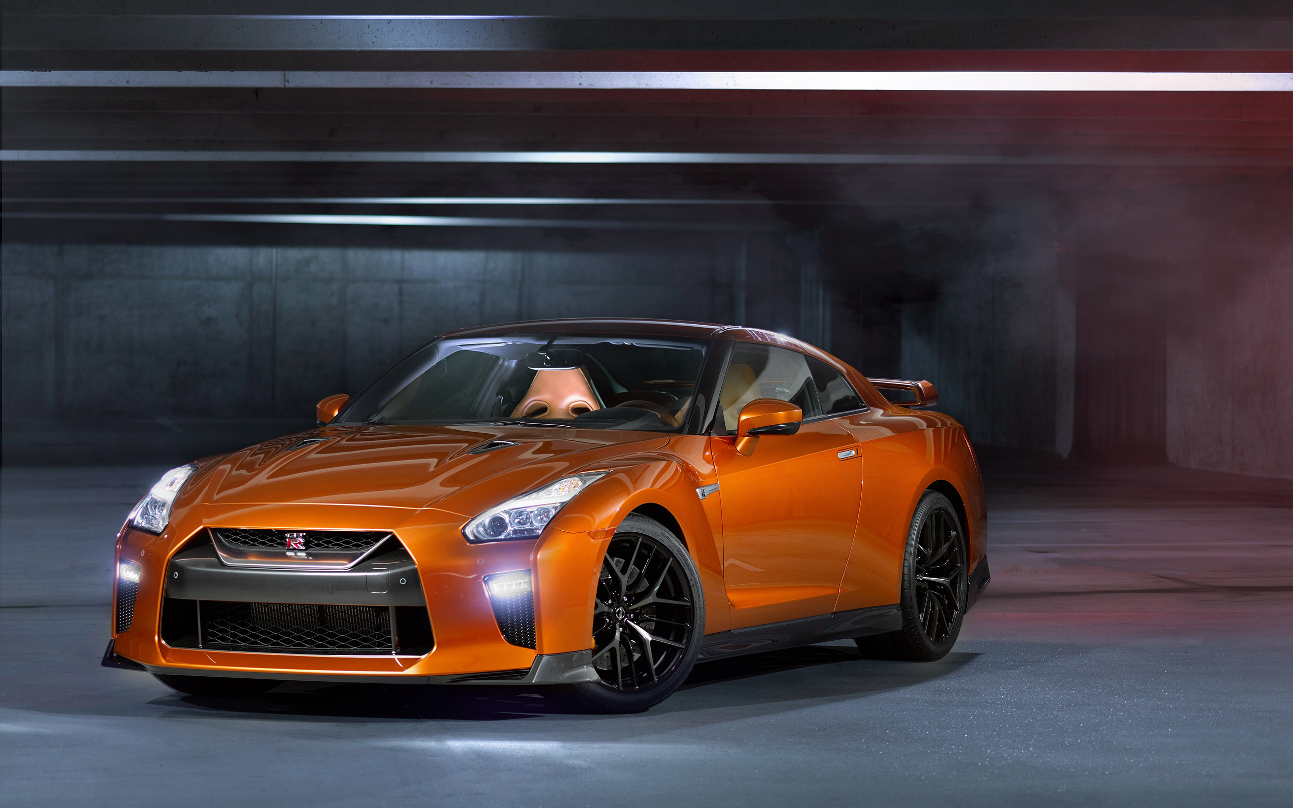 Orange Nissan GT-R R35 in a parking garage HD Wallpaper