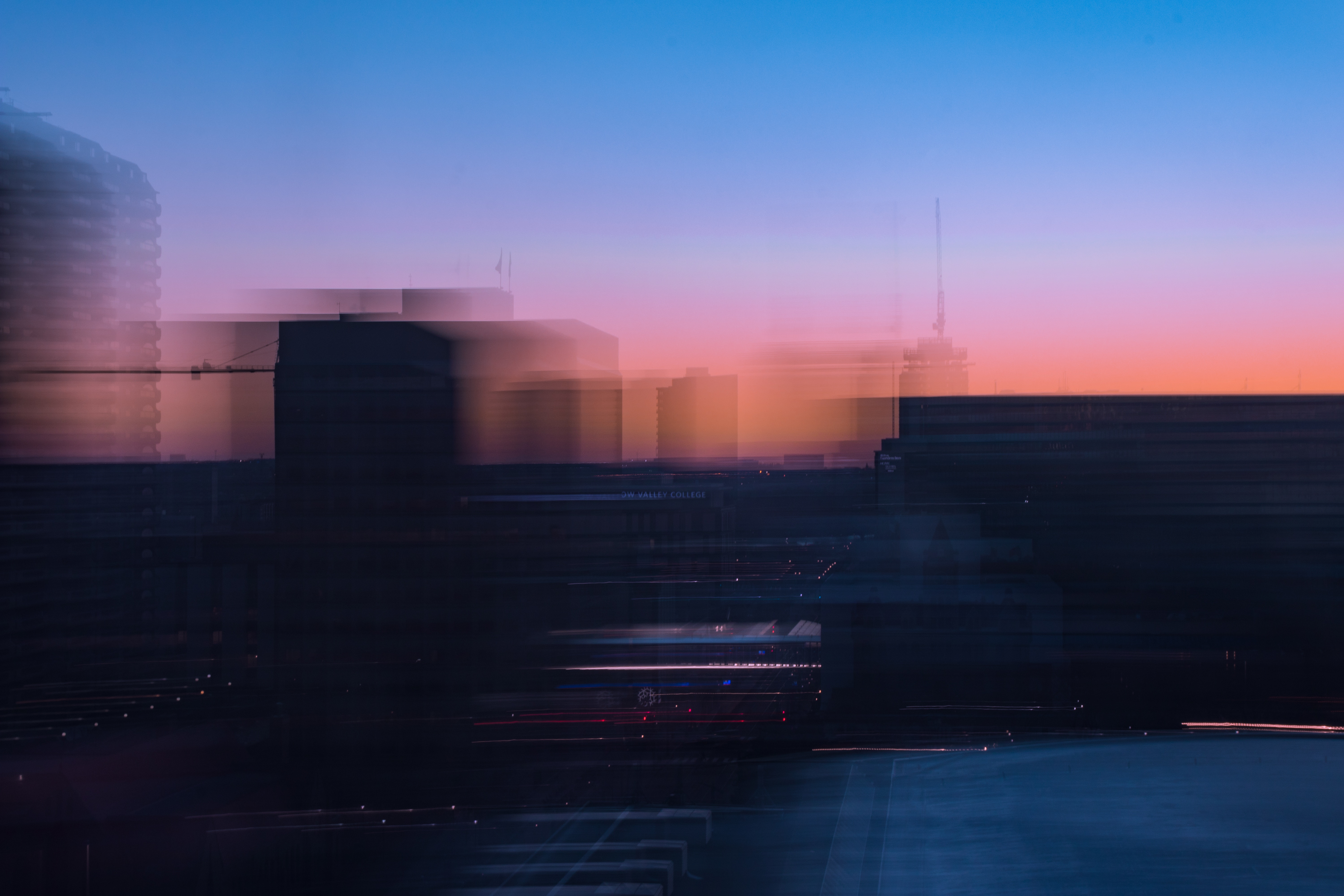 Cityscape at Dusk with Motion Blur HD Wallpaper
