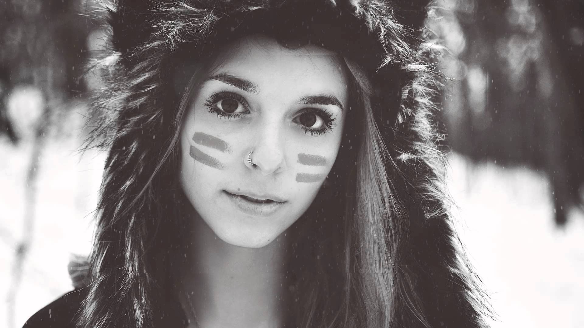 Woman with face paint and fluffy hat in winter HD Wallpaper