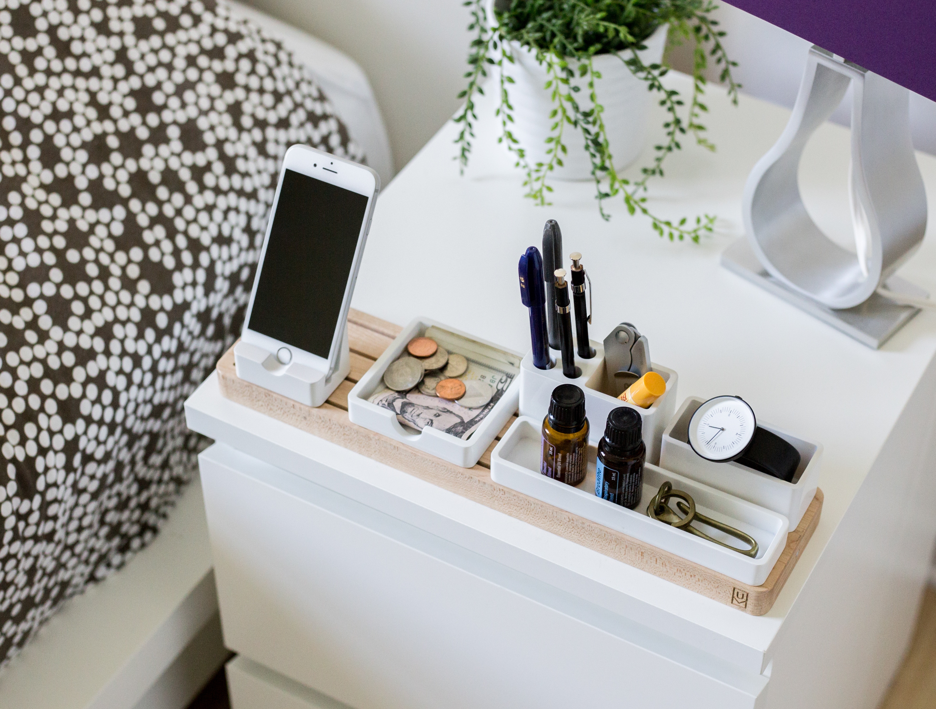 Nightstand organizer with iPhone, pens, coins, and watch HD Wallpaper
