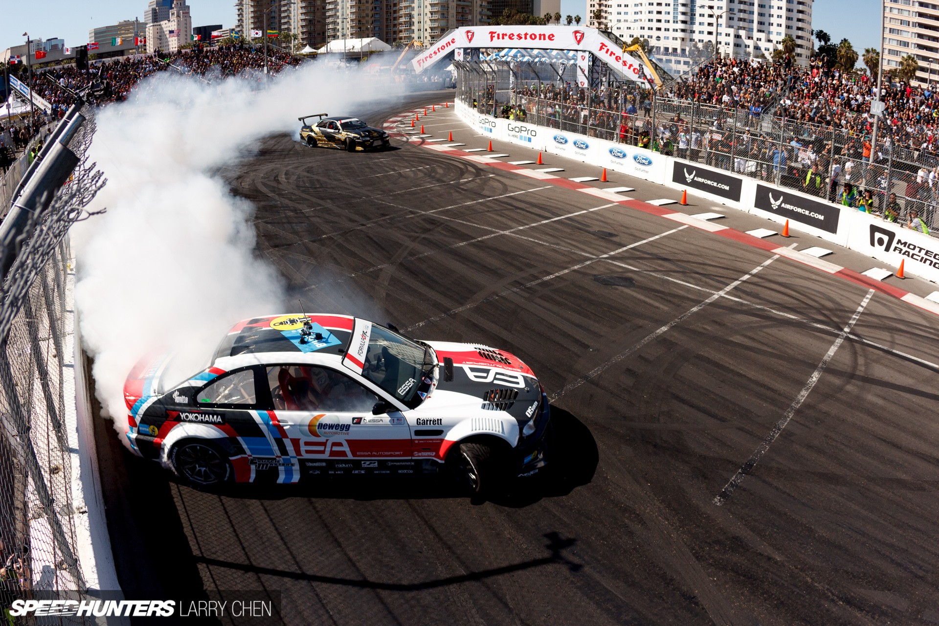 Formula Drift race with two cars drifting, Firestone arch HD Wallpaper
