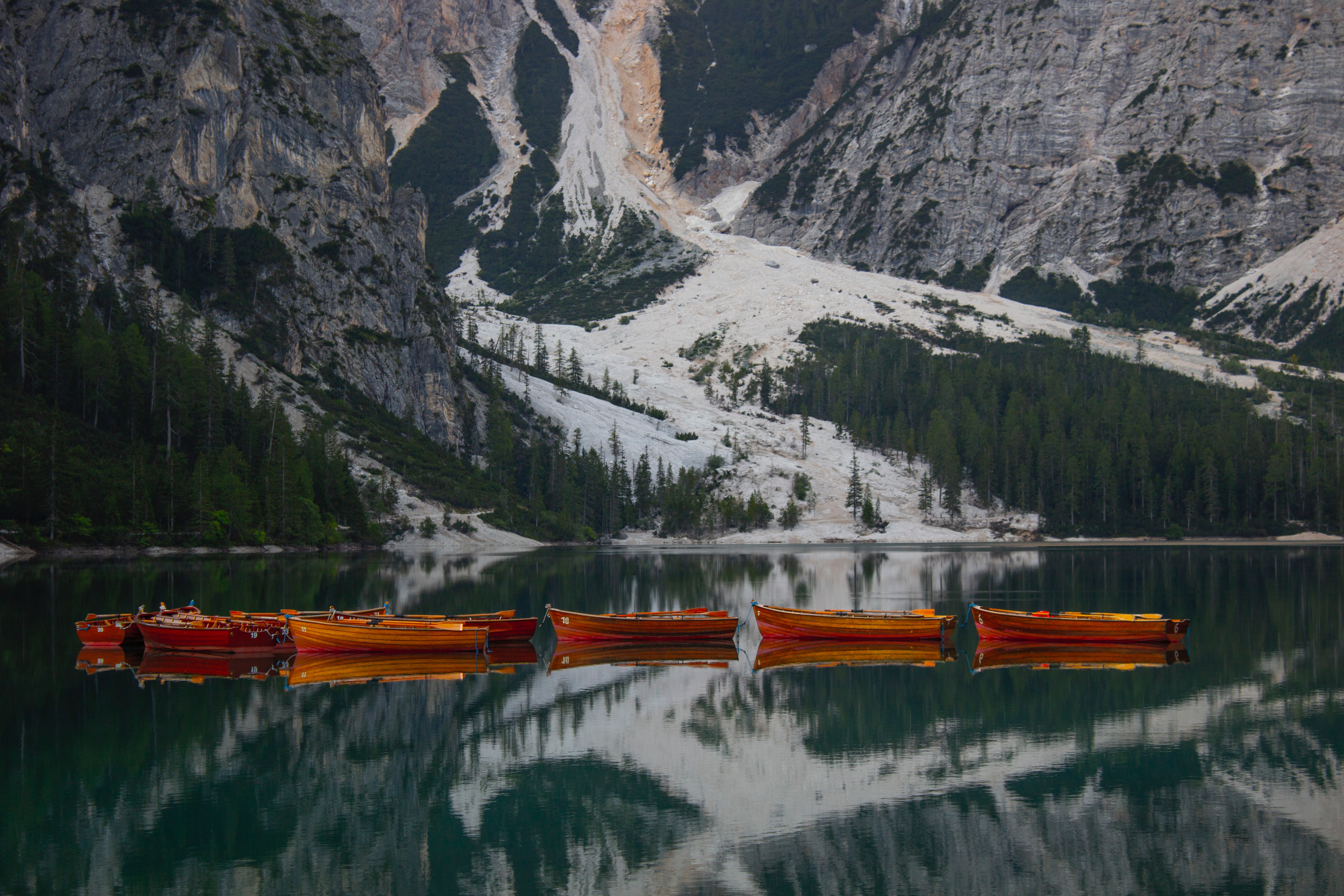 Boats on a mountain lake in the Dolomites HD Wallpaper