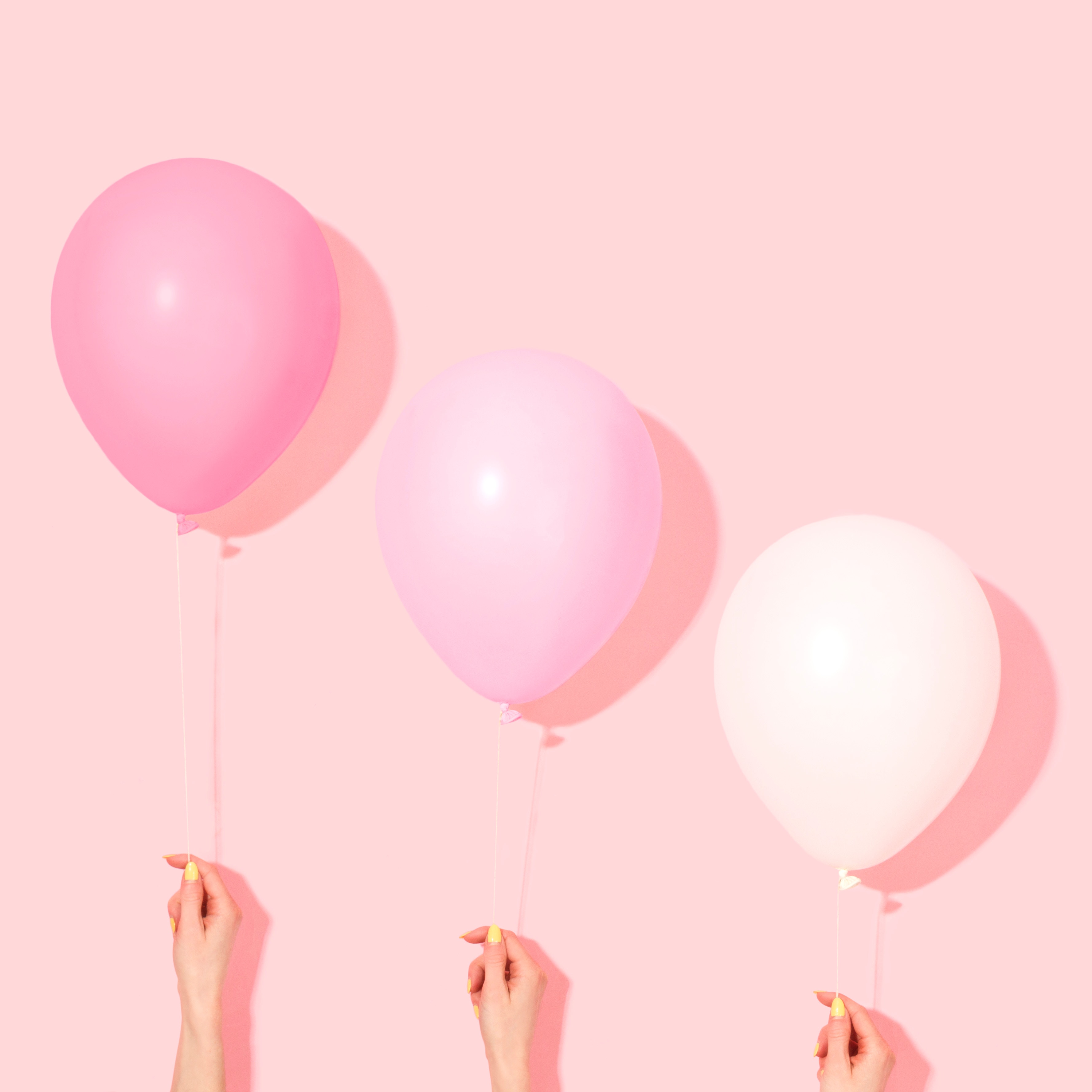 Three Hands Holding Pastel Pink Balloons HD Wallpaper