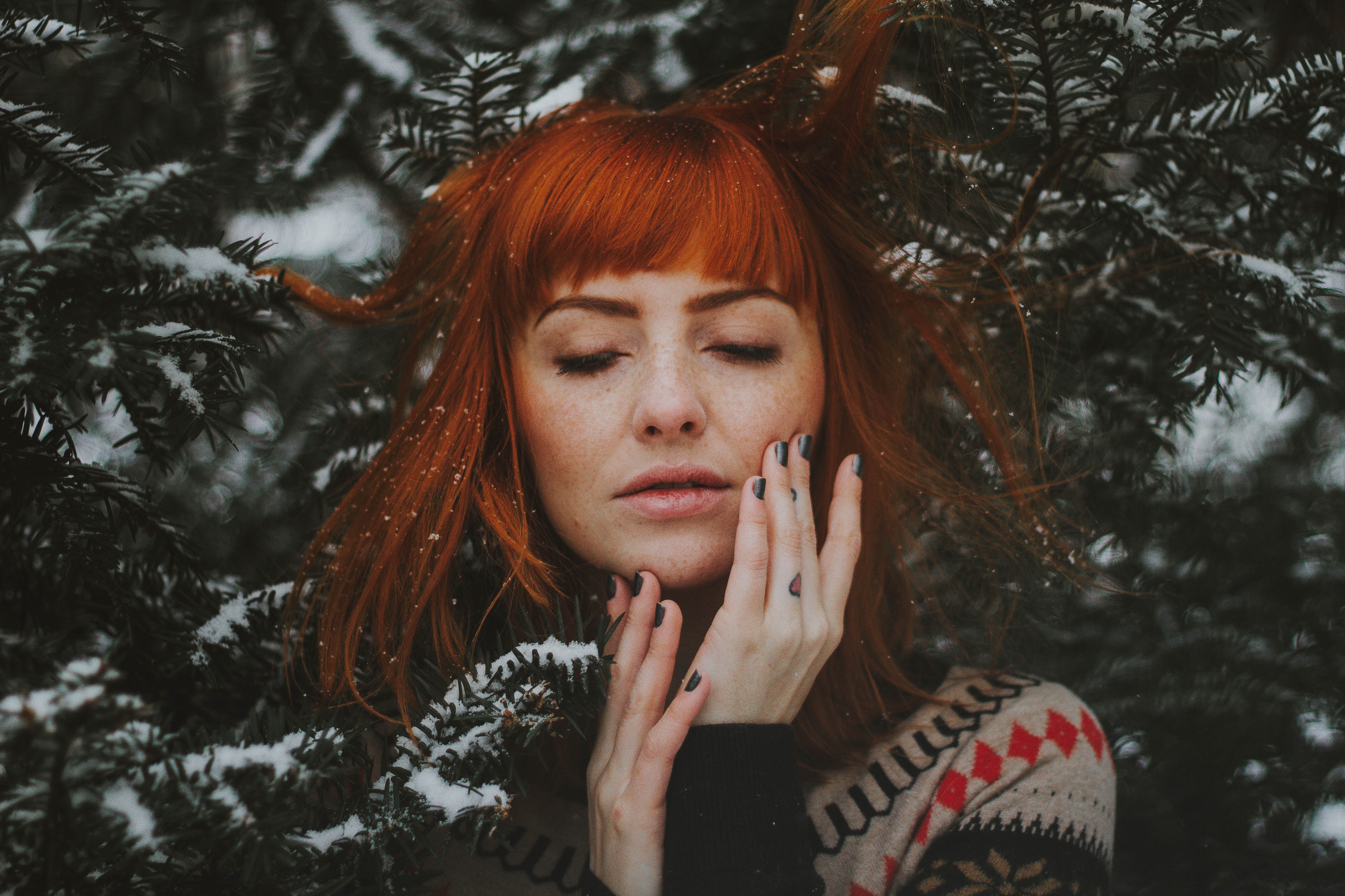 Woman with red hair and freckles in the snow HD Wallpaper