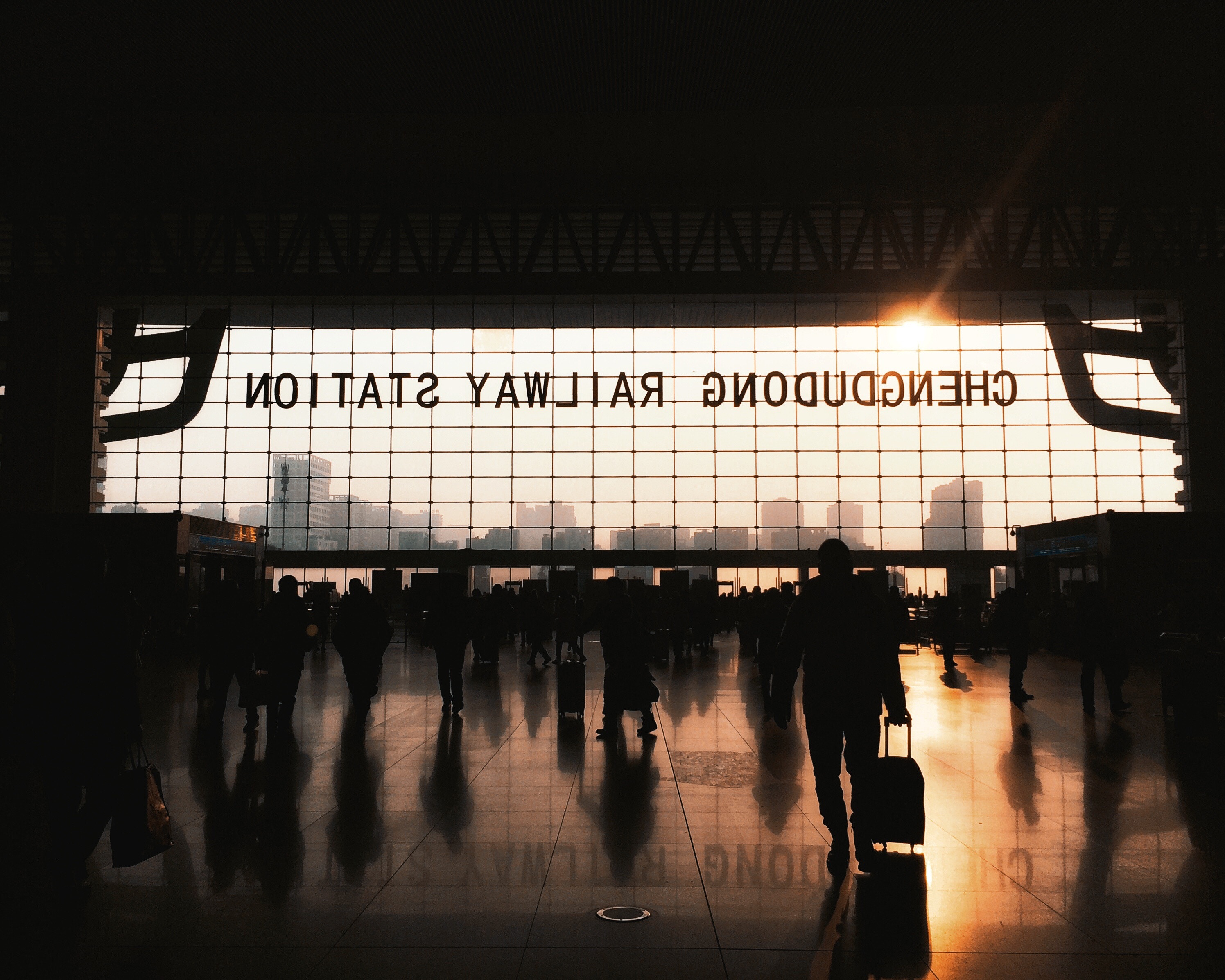 Chengdu Railway Station at sunset with silhouettes HD Wallpaper