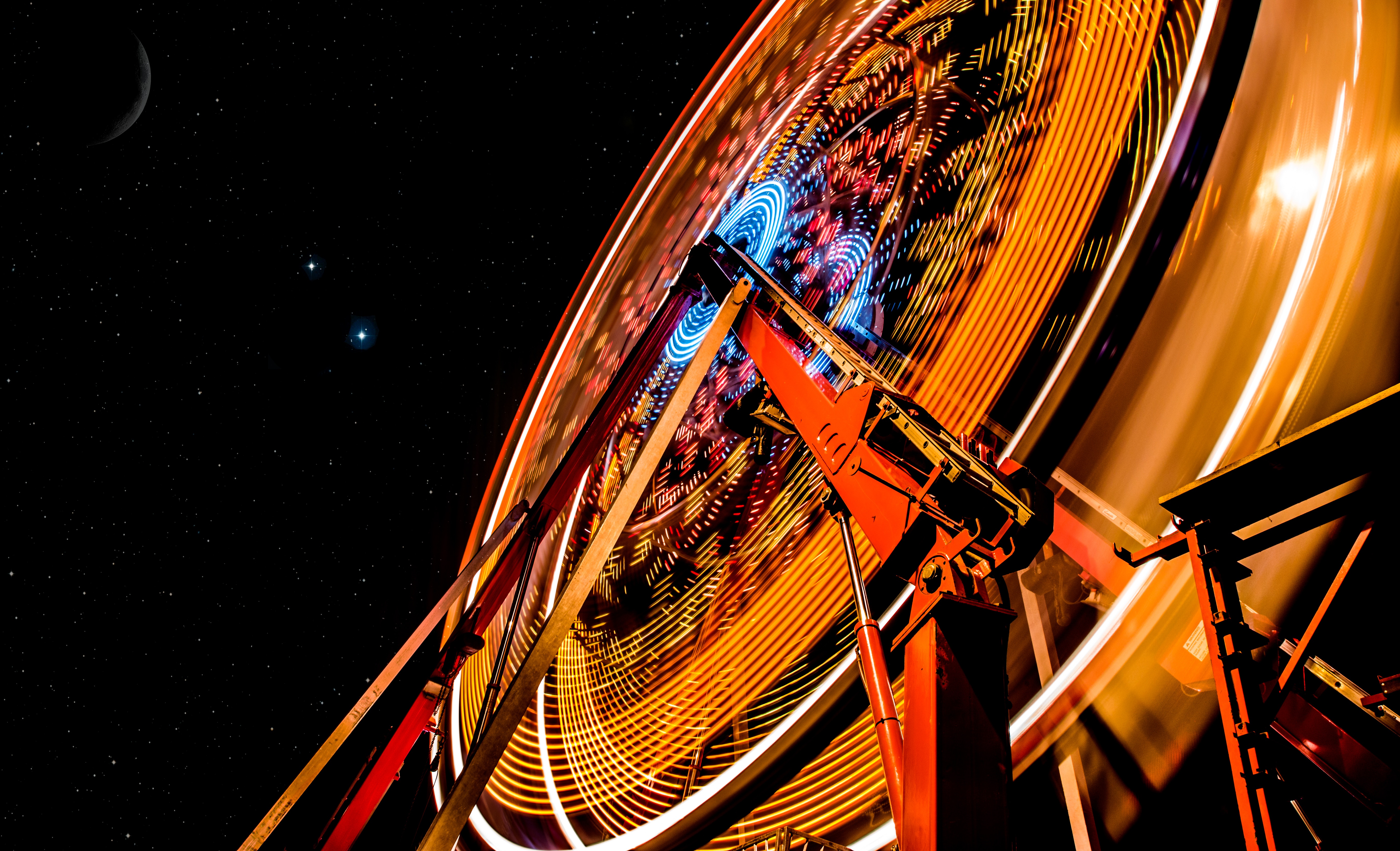 Ferris wheel at night with moon and stars HD Wallpaper