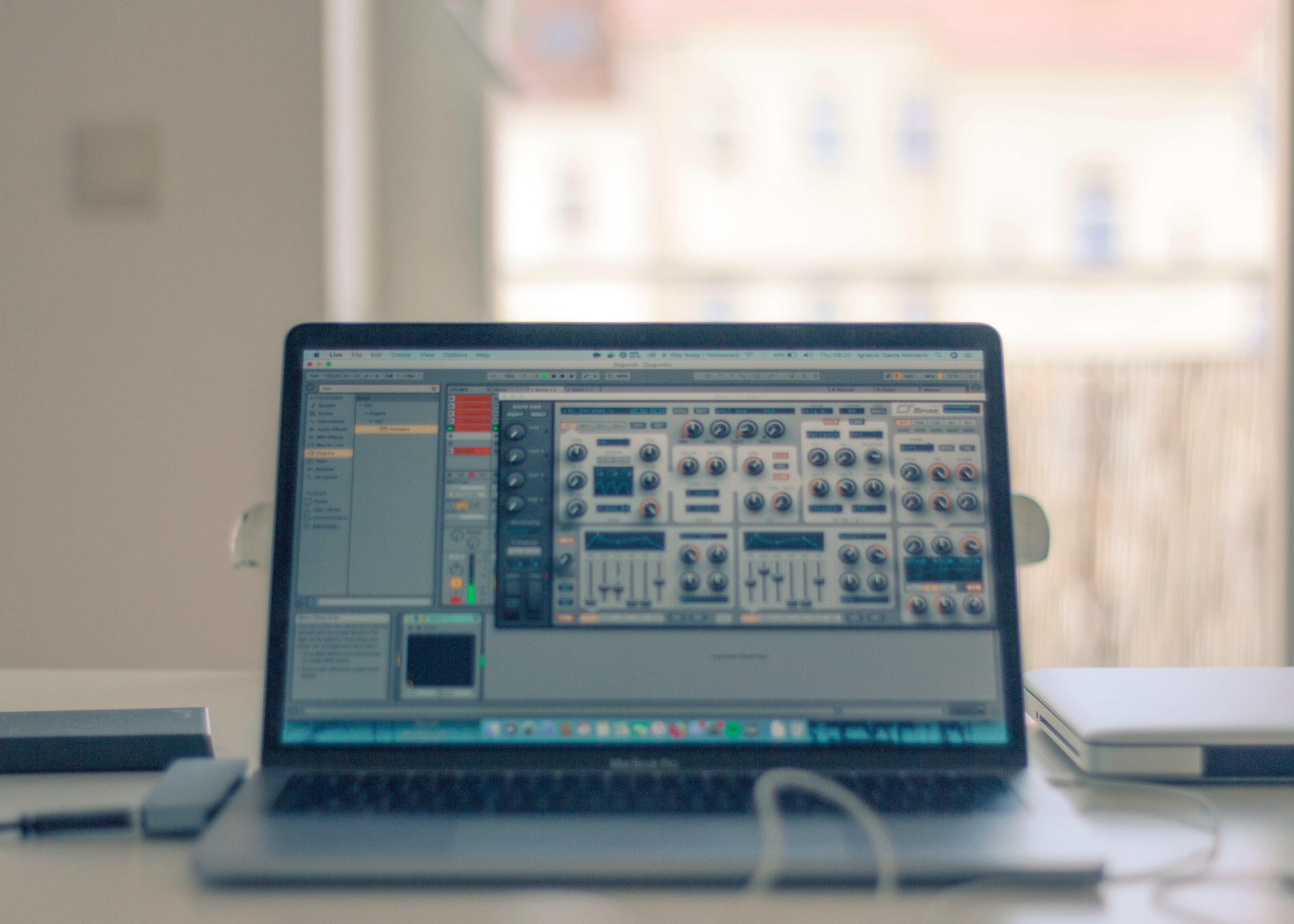 Laptop with audio software on a desk HD Wallpaper