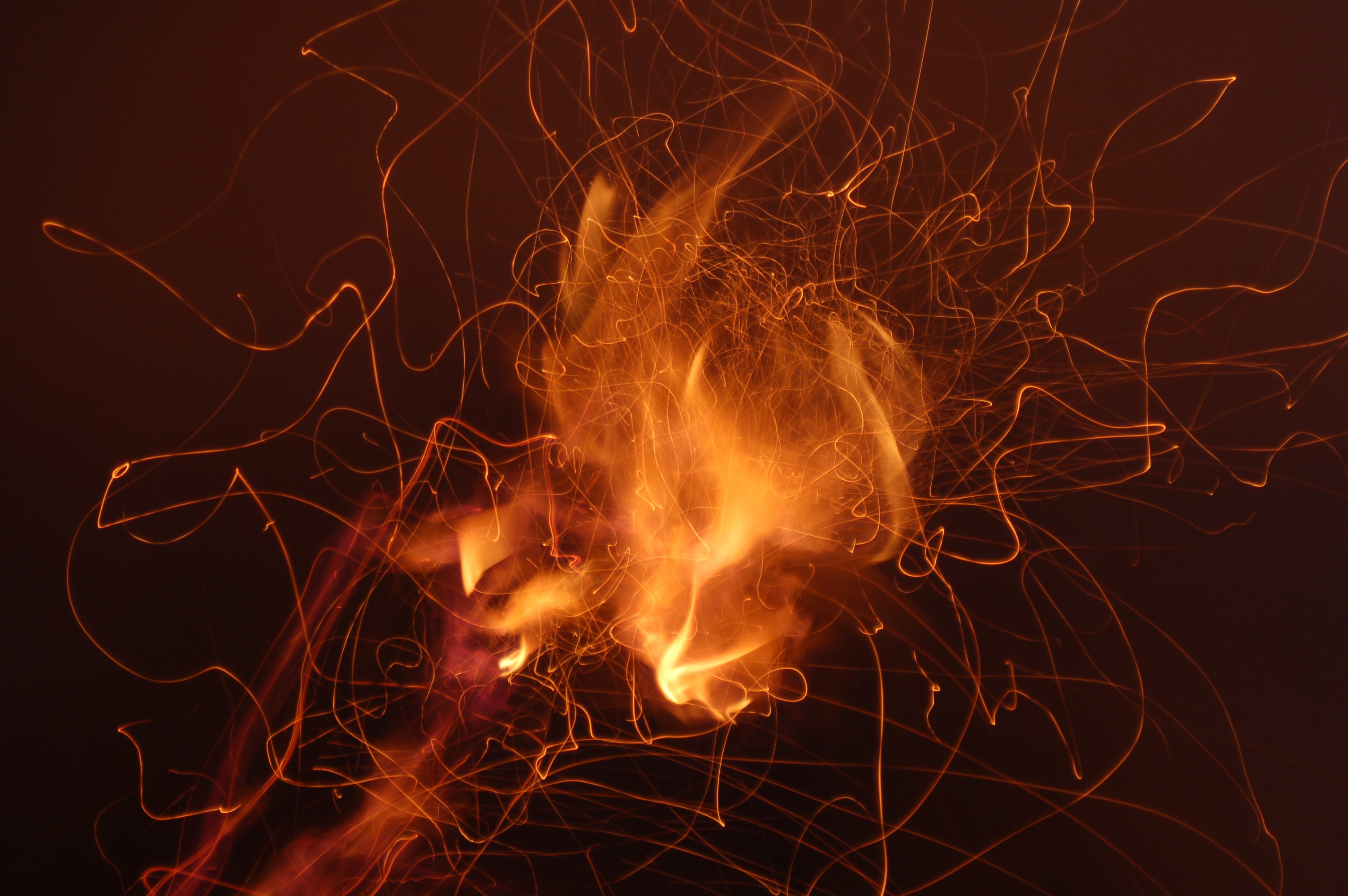 Abstract fire and sparks in the dark HD Wallpaper