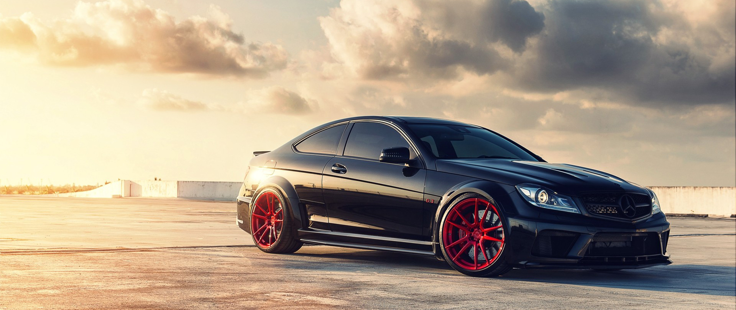 Black Mercedes-Benz C-Class Coupe with Red Wheels HD Wallpaper