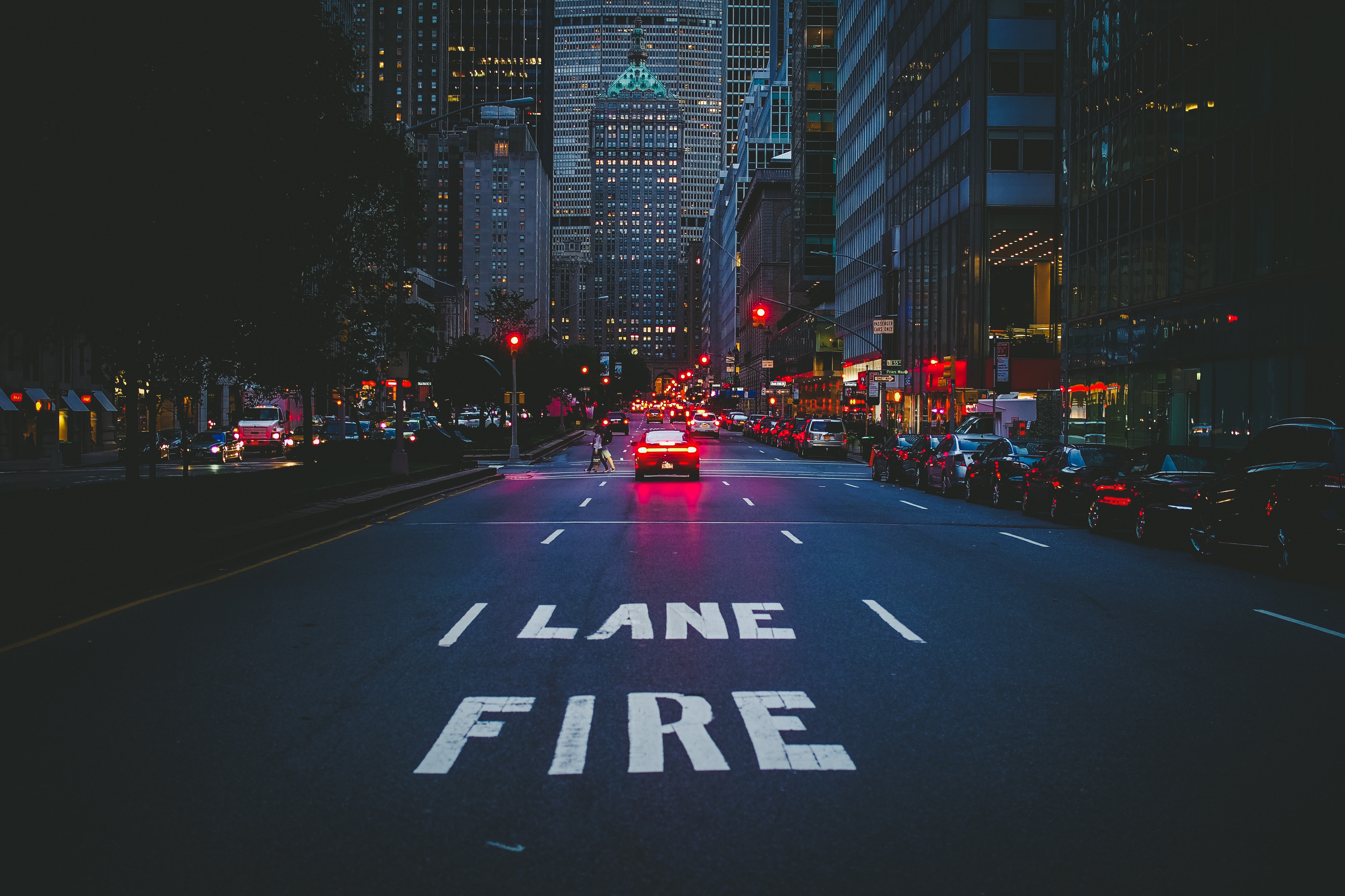 New York City street at night with fire lane marking HD Wallpaper