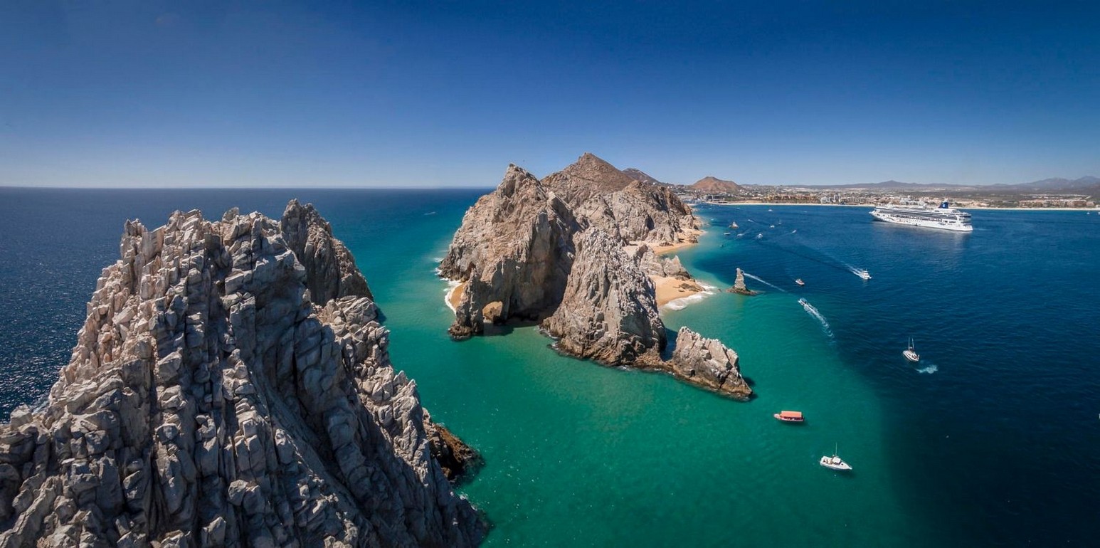 Aerial view of Cabo San Lucas with cruise ship and boats HD Wallpaper