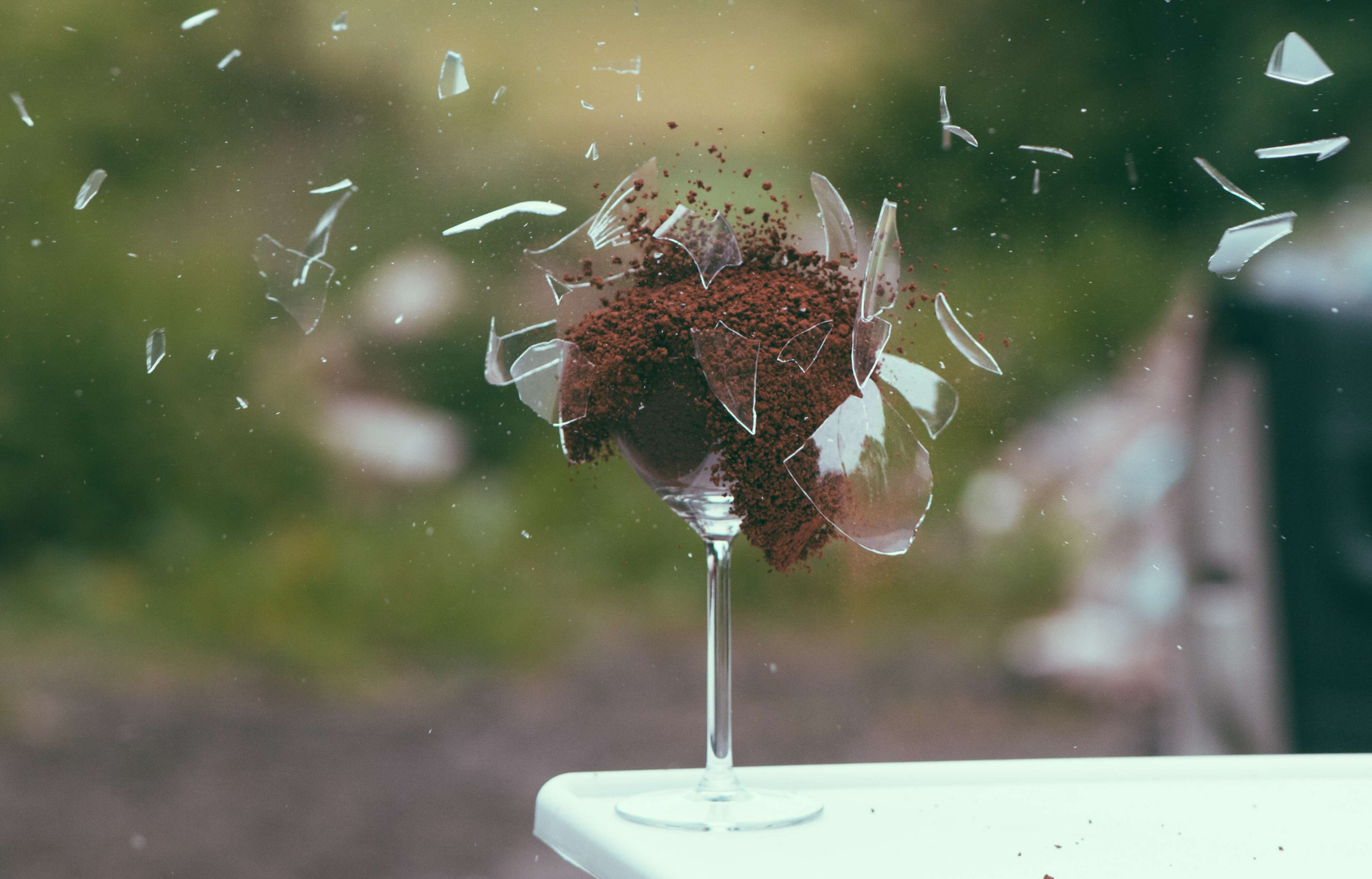 Explosion of coffee and glass in slow motion HD Wallpaper