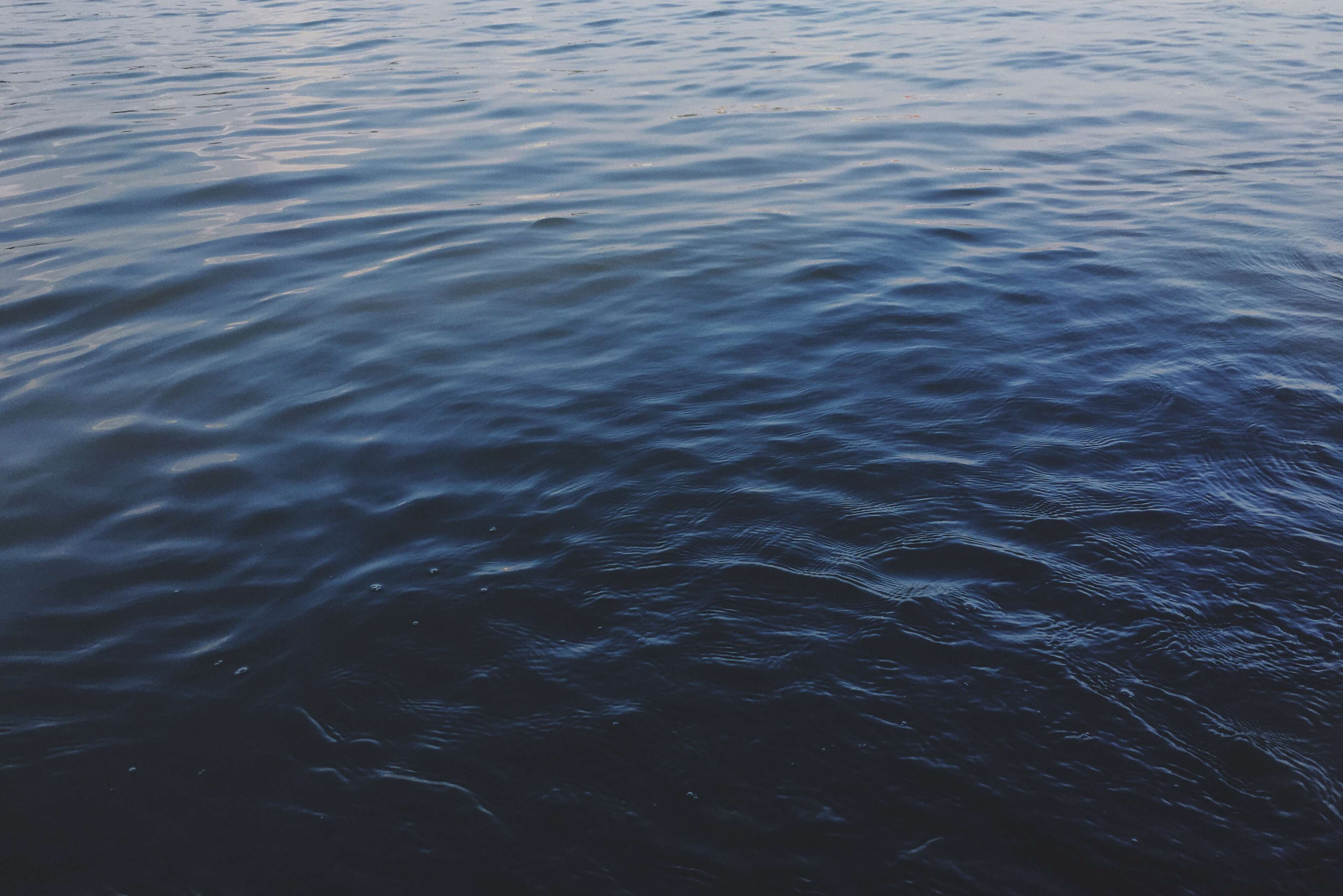 Dark Blue Water Surface with Ripples 4K HD Wallpaper