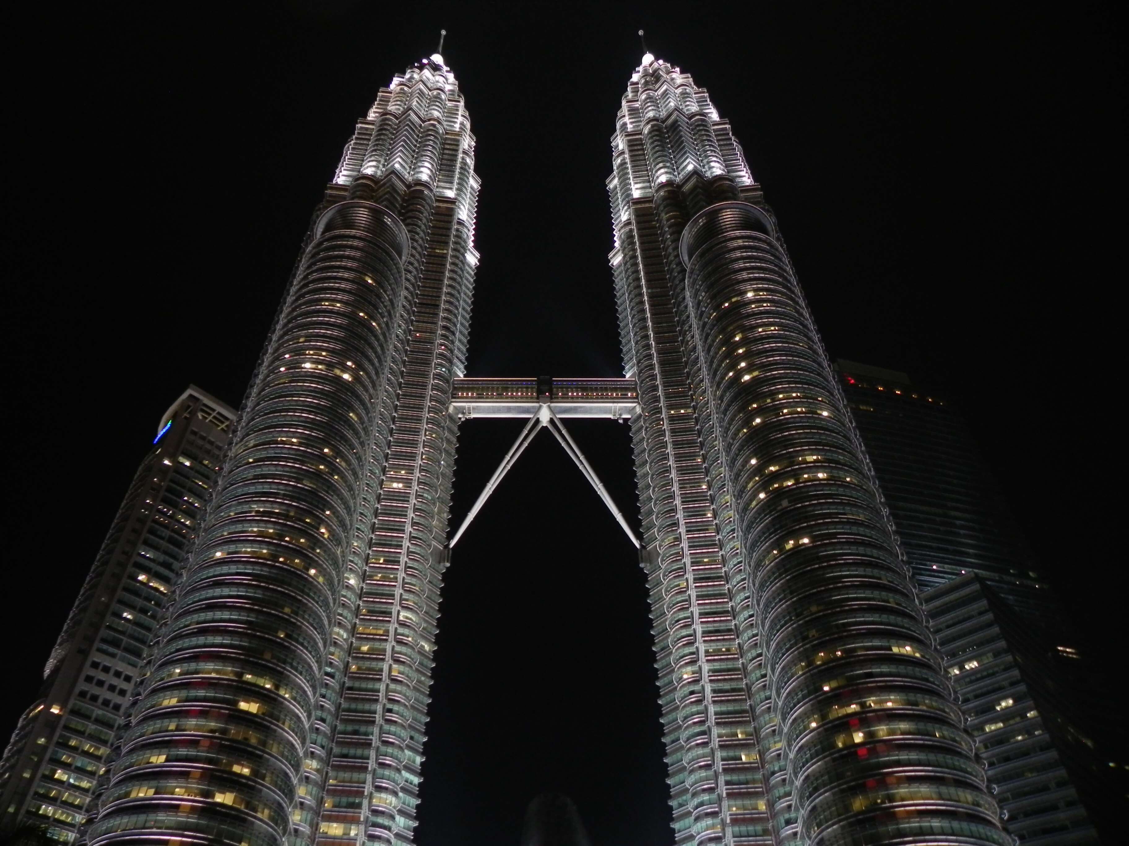Petronas Twin Towers with Skybridge at Night HD Wallpaper