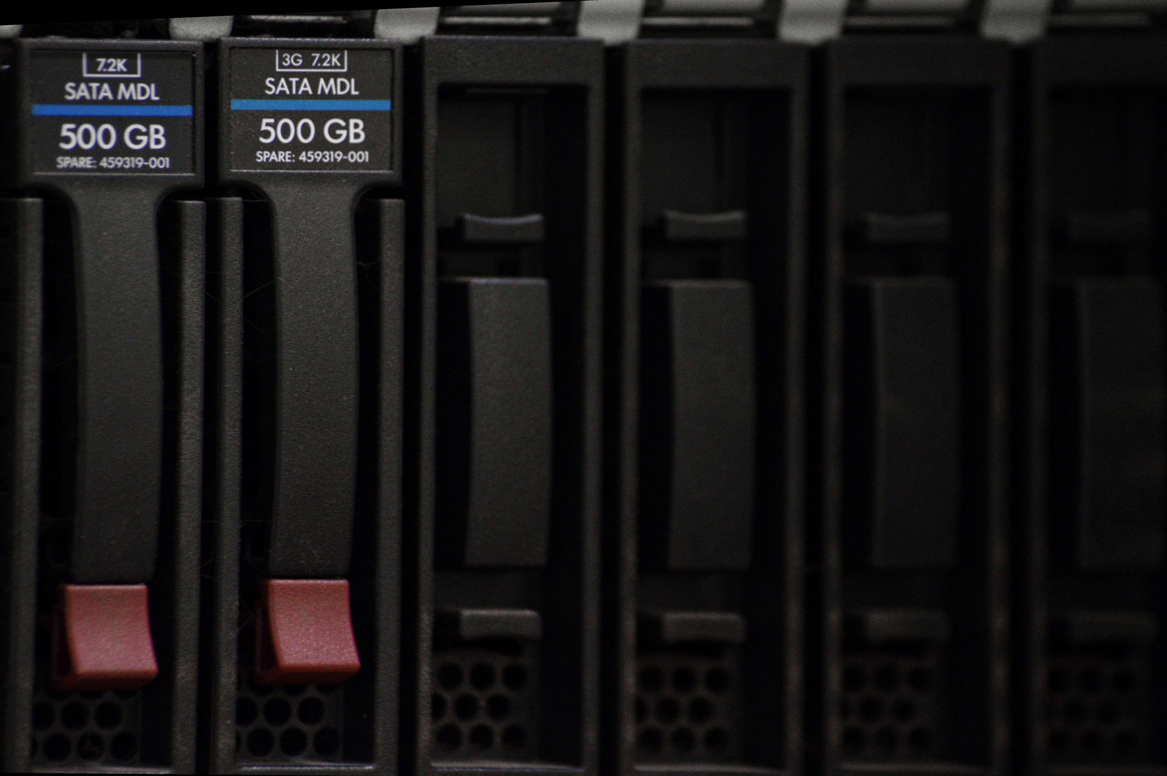 Server rack with SATA MDL hard drives HD Wallpaper